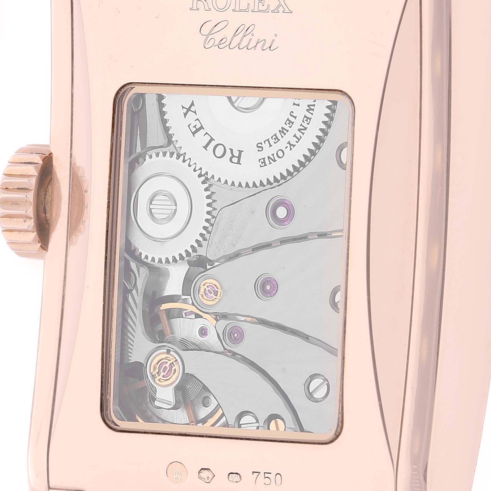 The image shows a close-up of the back of a Rolex Cellini 5442 Men's Rose Gold Black Dial 5442 Men's Rose Gold Black Dial watch, highlighting its inner mechanical movement and gears.