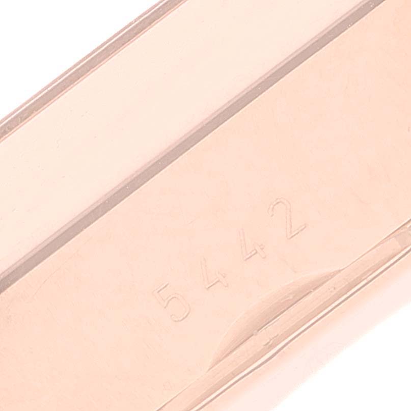 This image shows a close-up of the side of a Rolex Cellini 5442 Men's Rose Gold Black Dial 5442 Men's Rose Gold Black Dial watch buckle, displaying the engraved number "5442".