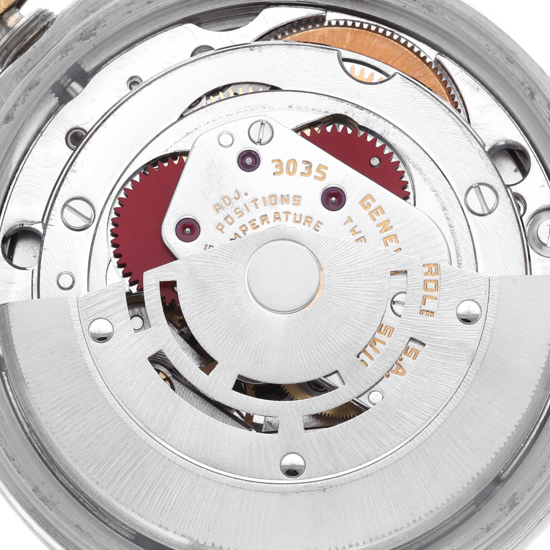 The image shows the intricate movement of a Rolex Vintage Collection 15003 Men's Steel and Gold (two tone) Champagne Dial 15003 Men's Steel and Gold (two tone) Champagne Dial watch mechanism from a top-down angle.