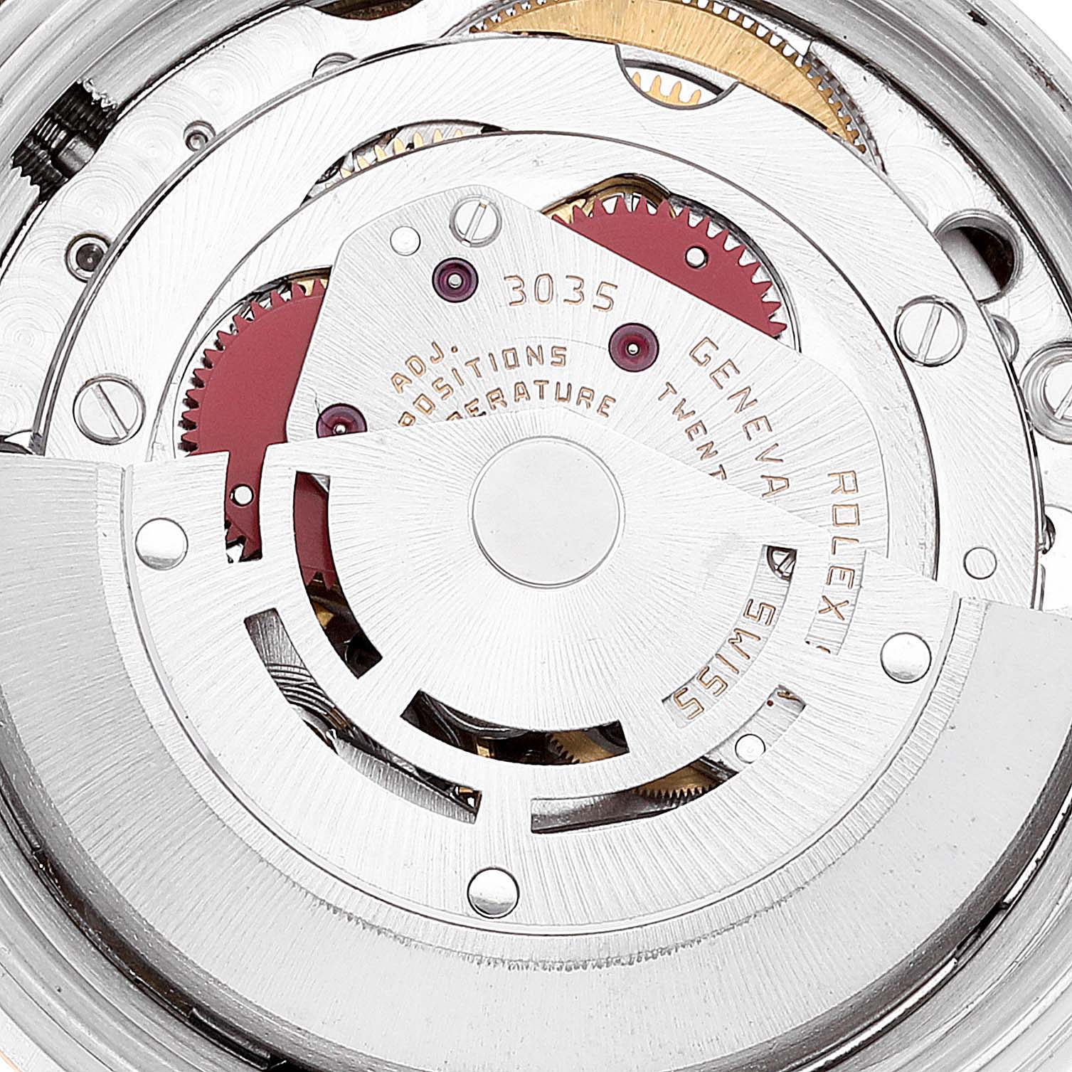 This image shows a close-up view of the intricate internal mechanical components of the Rolex Vintage Collection 16013 Men
s Steel and Gold (two tone) Champagne Dial 16013 Men
s Steel and Gold (two tone) Champagne Dial watch model, focusing on its movement and gears.