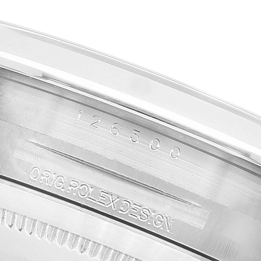 This image shows the side angle of the Rolex Datejust 41 126300 Men's Stainless Steel Silver Dial 126300 Men's Stainless Steel Silver Dial model featuring its engraved model and design details.