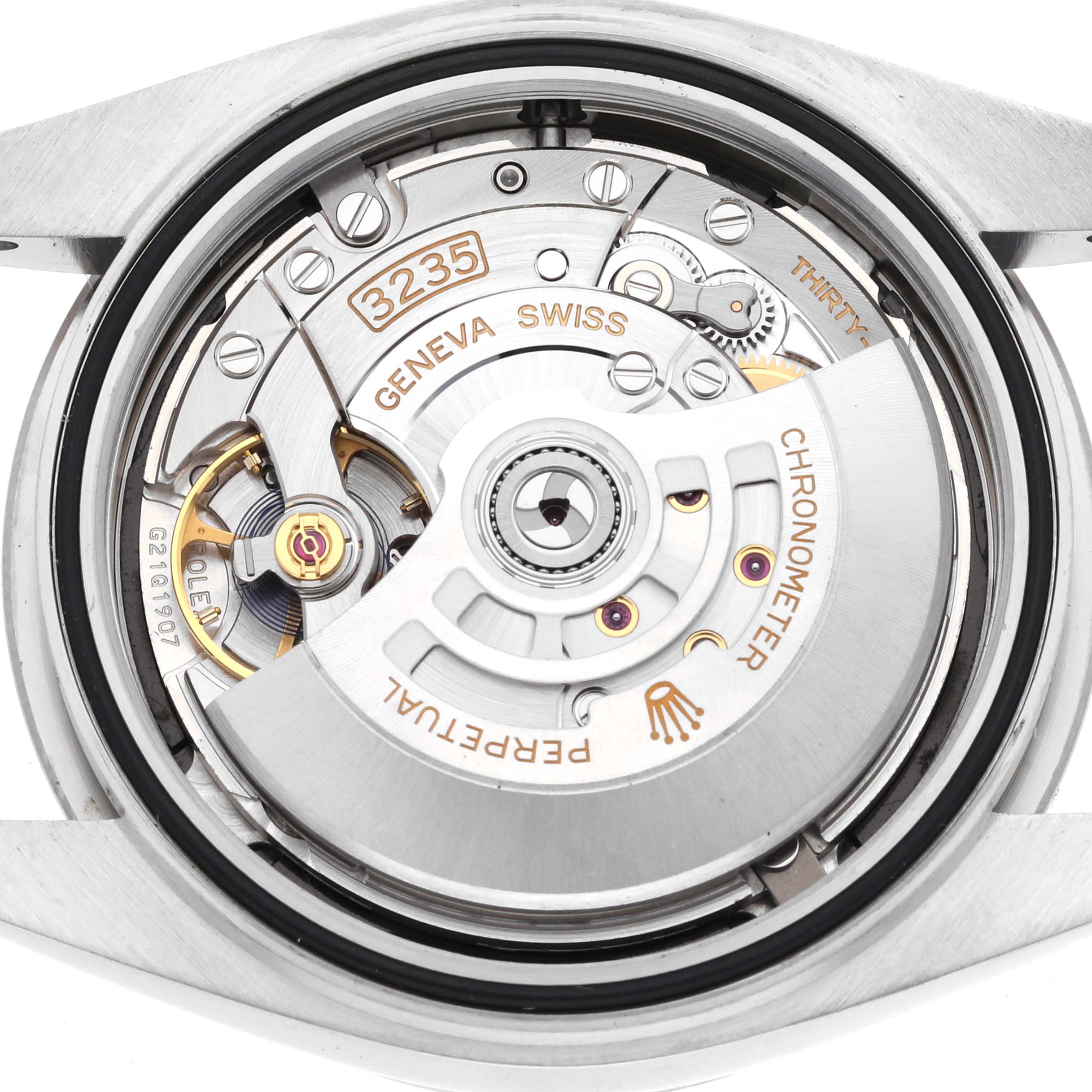 The image shows an exposed view of the Rolex Datejust 41 126334 Men's Stainless Steel Black Dial 126334 Men's Stainless Steel Black Dial's movement, focusing on its intricate internal mechanisms.