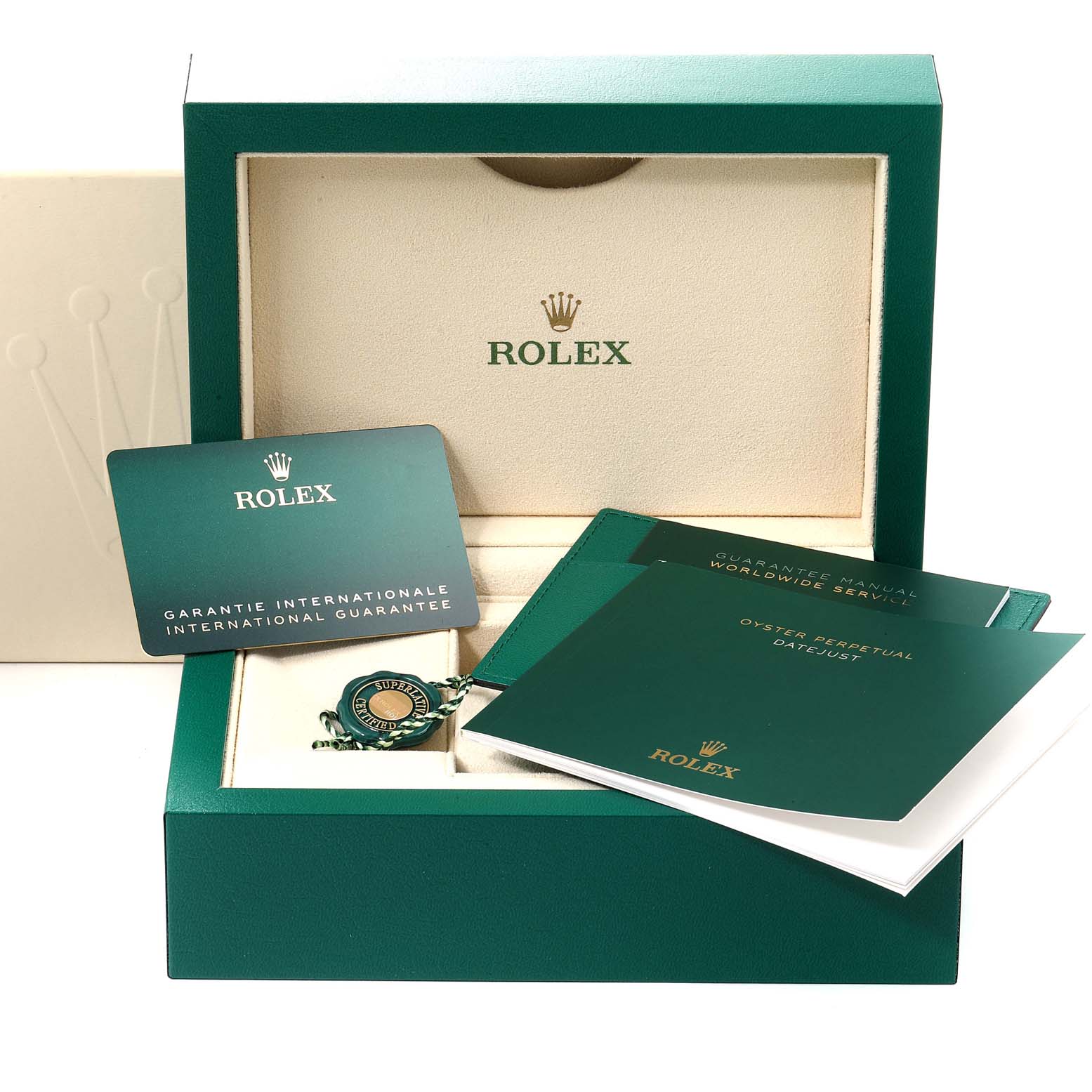 The image shows accessories for the Rolex Datejust 41 126334 Men
s Stainless Steel Blue Dial 126334 Men
s Stainless Steel Blue Dial model, including manuals, an international guarantee card, and the original packaging.