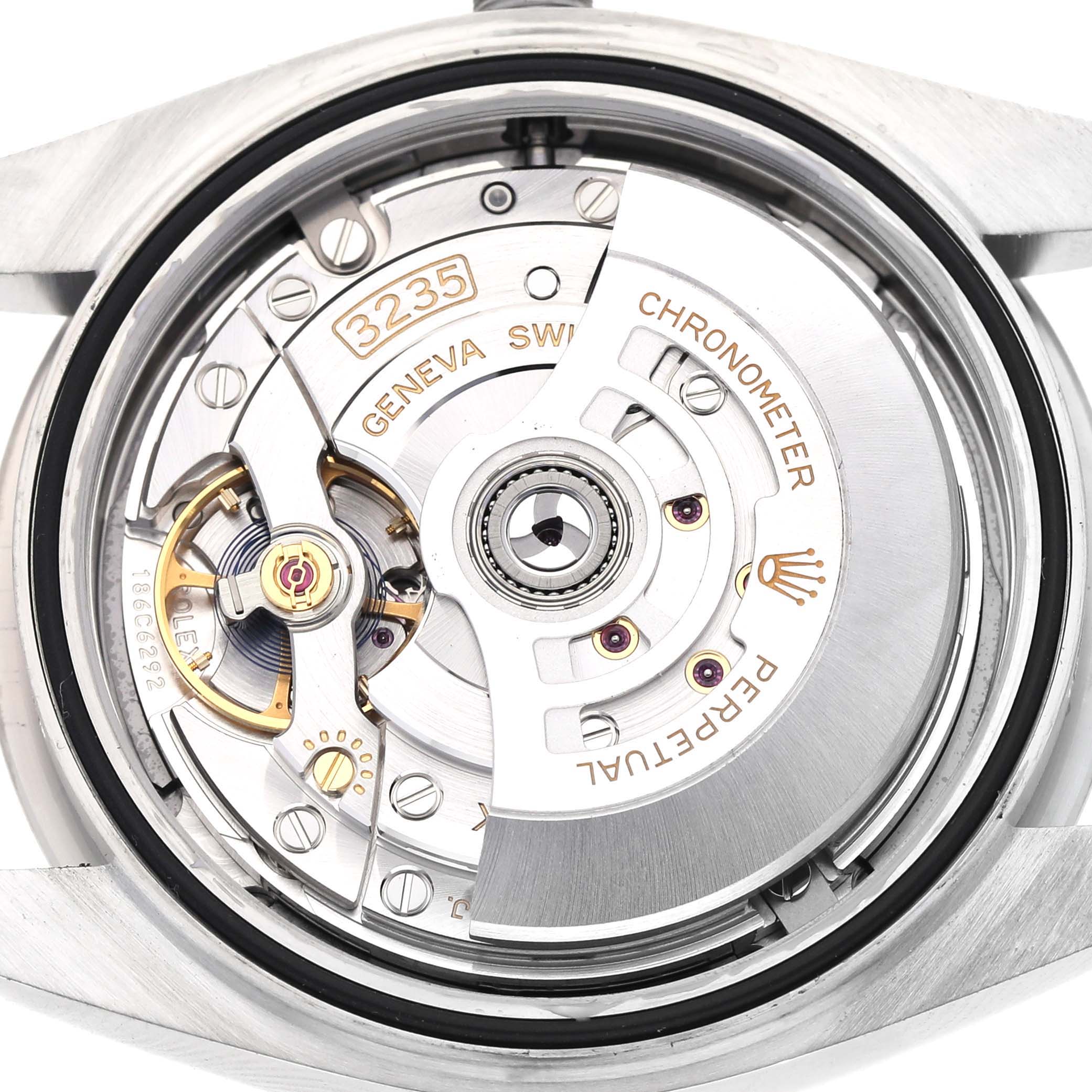 The image shows the movement of a Rolex Datejust 41 126334 Men
s Stainless Steel Blue Dial 126334 Men
s Stainless Steel Blue Dial, displaying its intricate internal mechanism from the back.