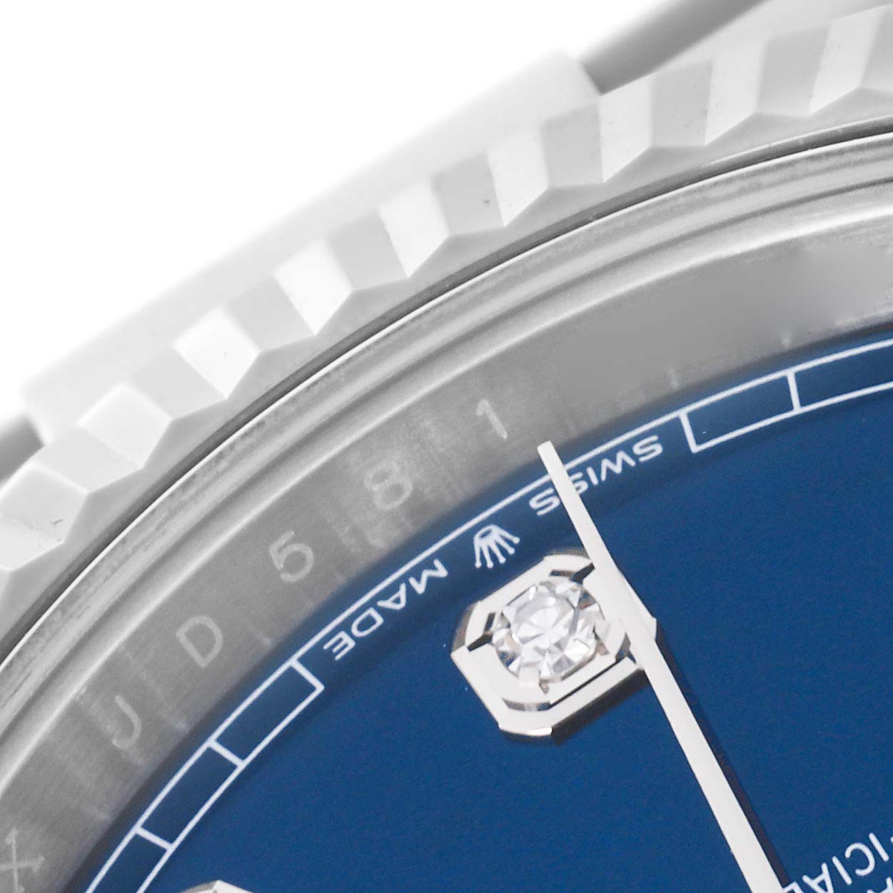 The image shows a close-up of the bezel, hour marker, and dial of a Rolex Datejust 41 126334 Men
s Stainless Steel Blue Dial 126334 Men
s Stainless Steel Blue Dial watch.