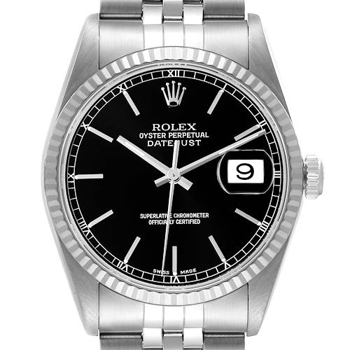 The Rolex Datejust watch is shown from the front, displaying its black dial, date window, and fluted bezel.