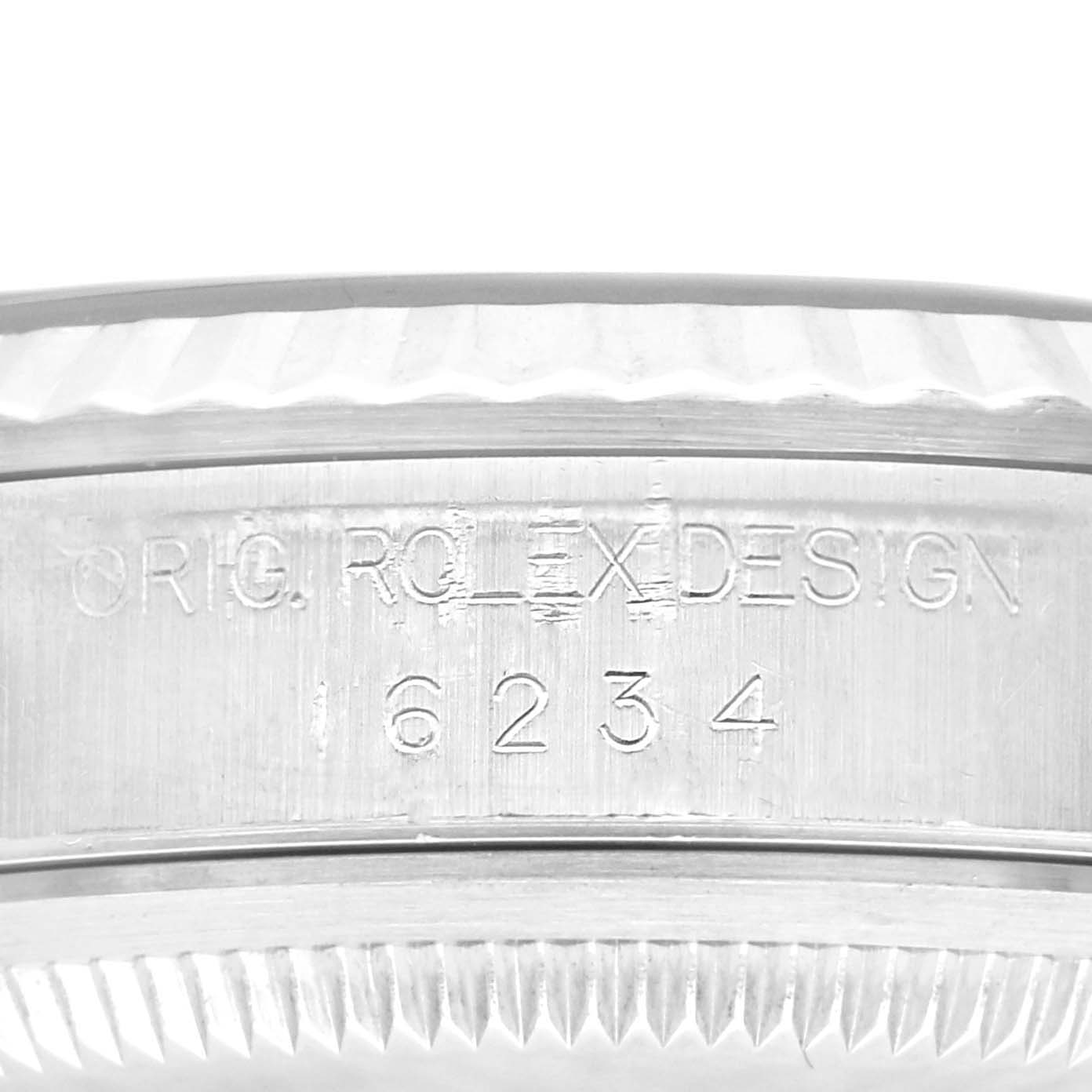 The image shows a close-up of the side case engraving on a Rolex Datejust 16234 Men
s Stainless Steel Black Dial 16234 Men
s Stainless Steel Black Dial watch, displaying the model number.