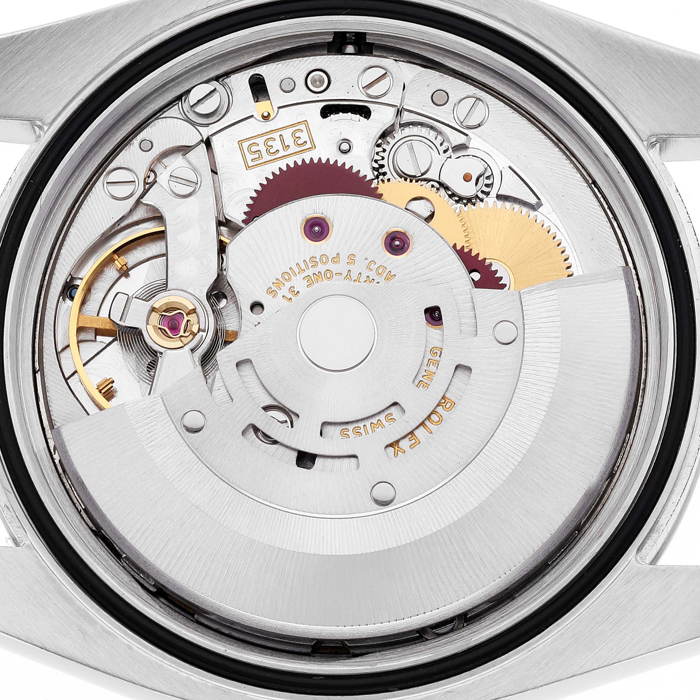 The image shows the movement and internal mechanism from the back of the Rolex Datejust 116200 Men's Stainless Steel Black Dial 116200 Men's Stainless Steel Black Dial watch.
