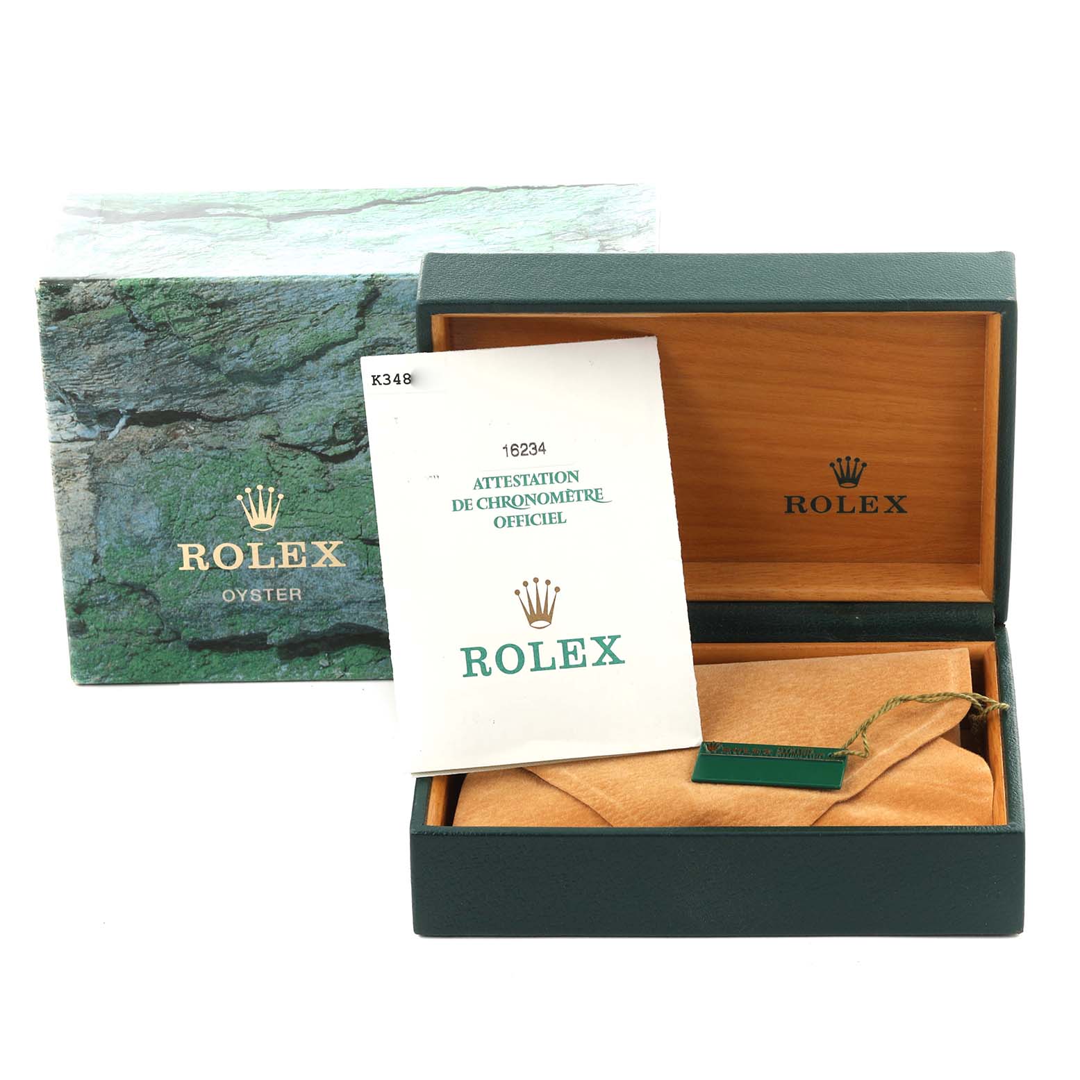 The image shows an open box with papers for the Rolex Datejust 16234G Men's Stainless Steel Blue Dial 16234G Men's Stainless Steel Blue Dial, highlighting packaging and documentation.
