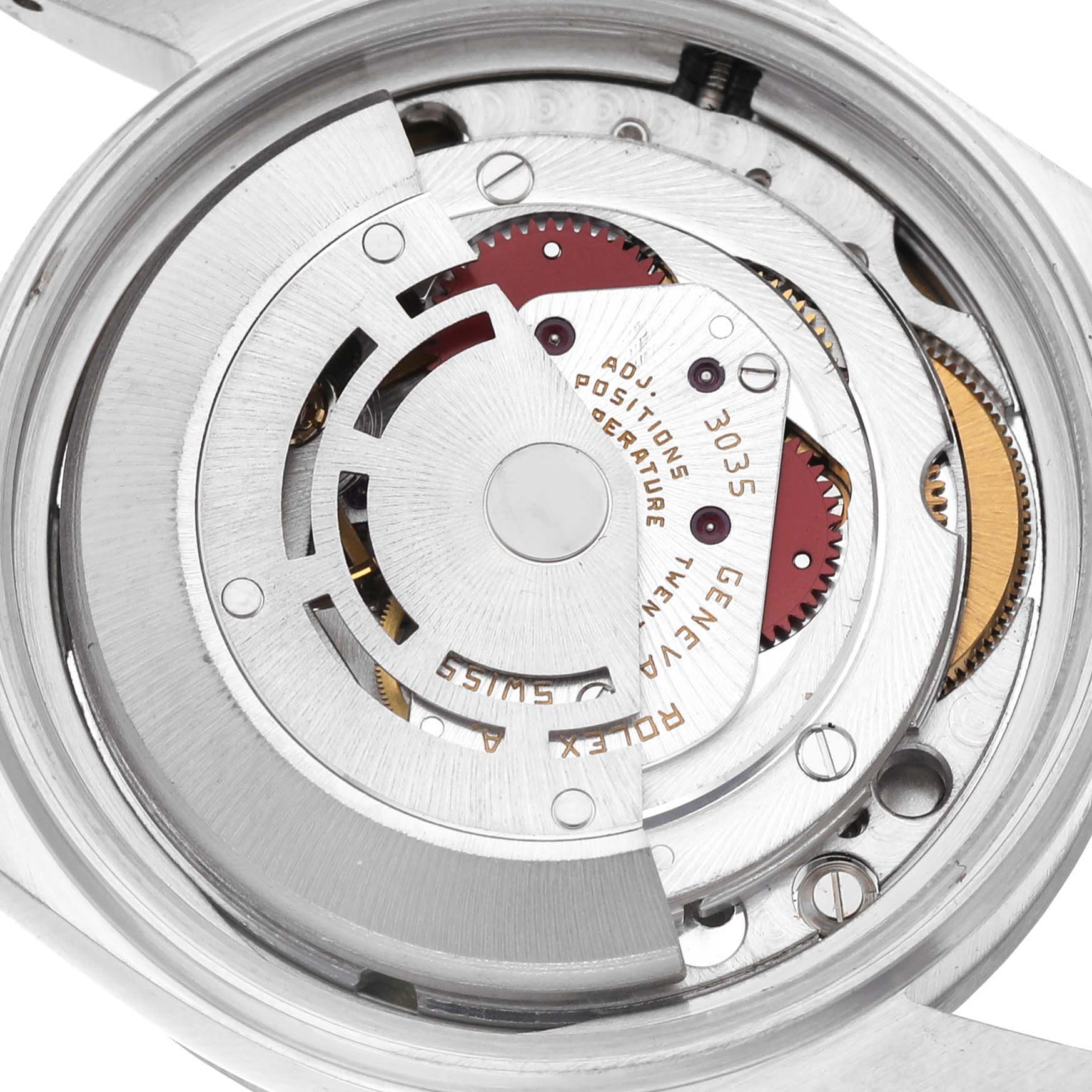 The image shows the movement mechanism of the Rolex Vintage Collection 16030 Men's Stainless Steel White Dial 16030 Men's Stainless Steel White Dial watch, including gears and the rotor.