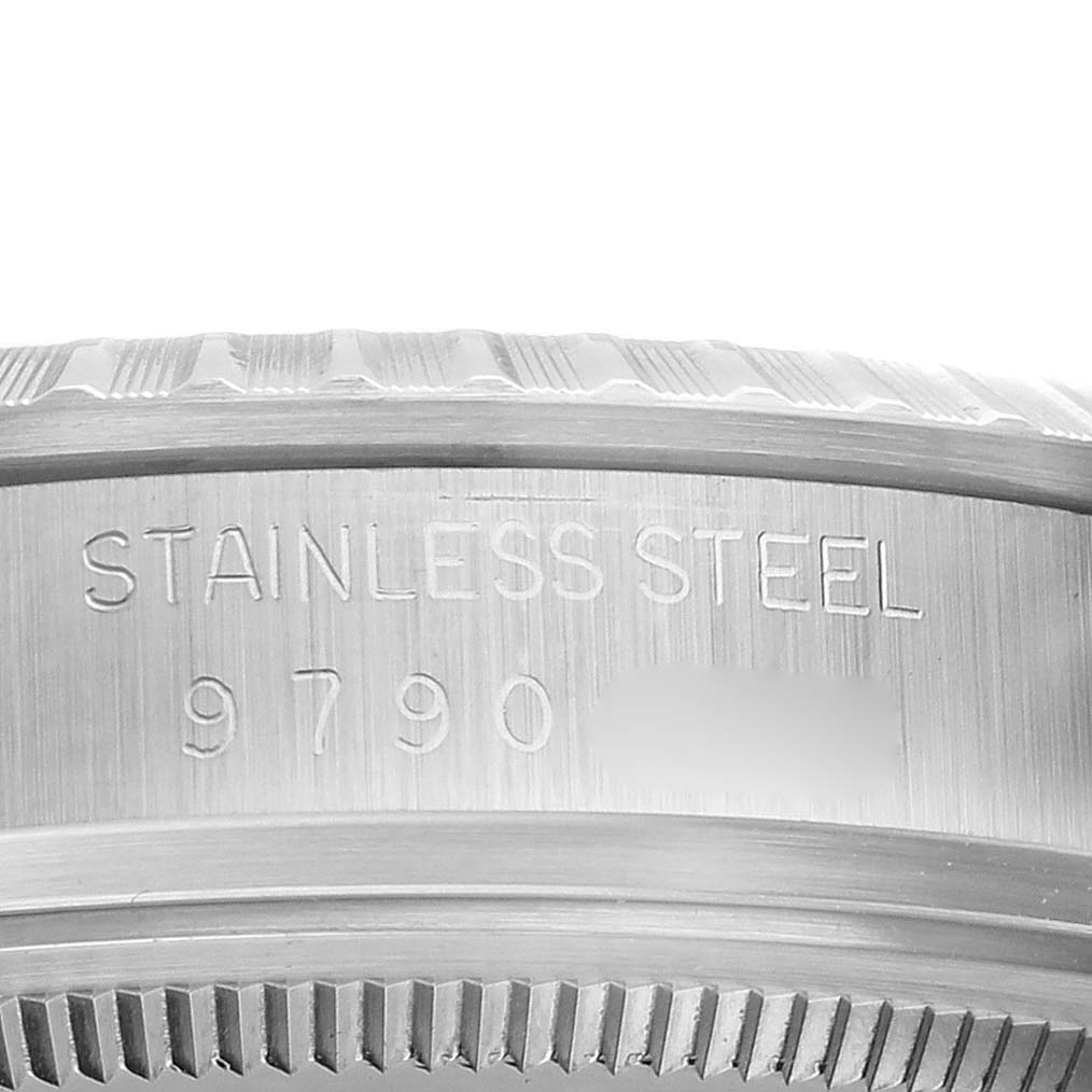 The image shows a close-up of the edge with engraved text on a Rolex Vintage Collection 16030 Men's Stainless Steel White Dial 16030 Men's Stainless Steel White Dial watch case.