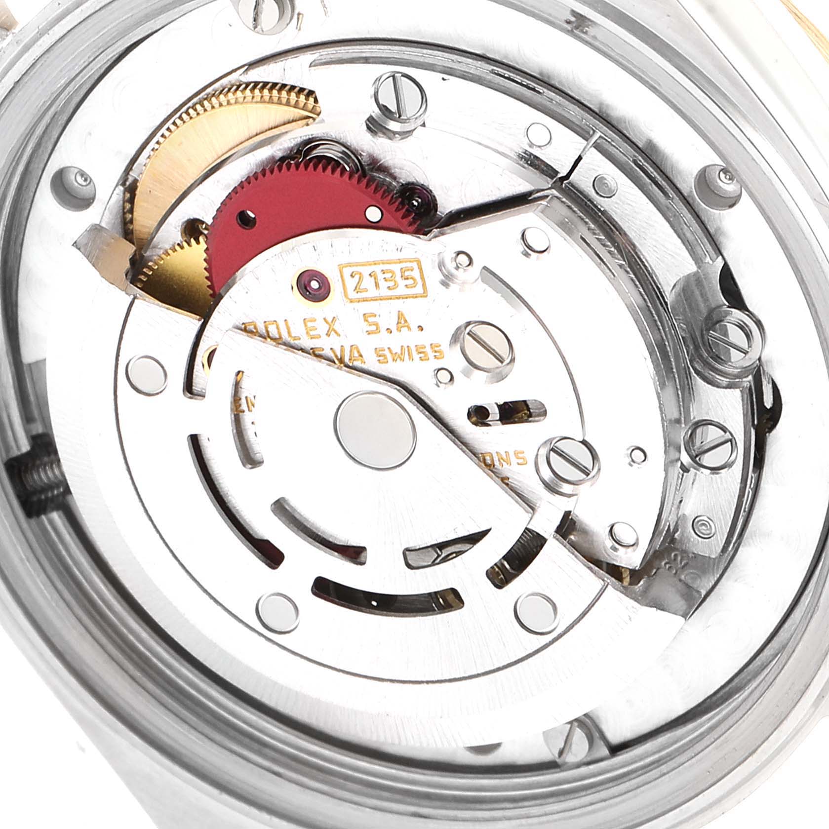 This is a close-up view of the movement mechanism of a Rolex Mid-Size 68273 Women's Steel and Gold (two tone) Champagne Dial 68273 Women's Steel and Gold (two tone) Champagne Dial model watch, showing the internal gears and components.