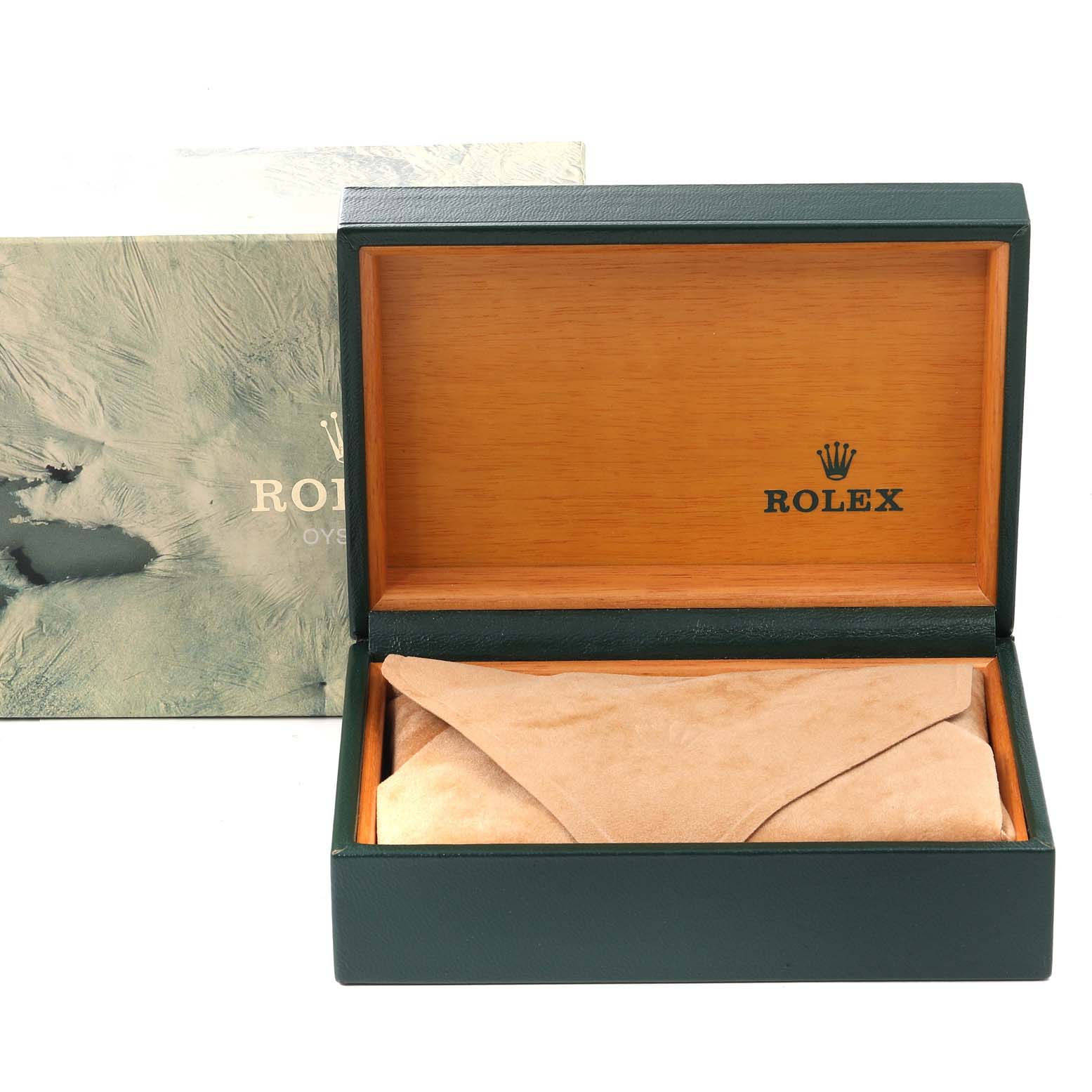 This image shows the open box for a Rolex Mid-Size 68273 Women's Steel and Gold (two tone) Champagne Dial 68273 Women's Steel and Gold (two tone) Champagne Dial model watch, revealing its interior and the watch cushion inside.