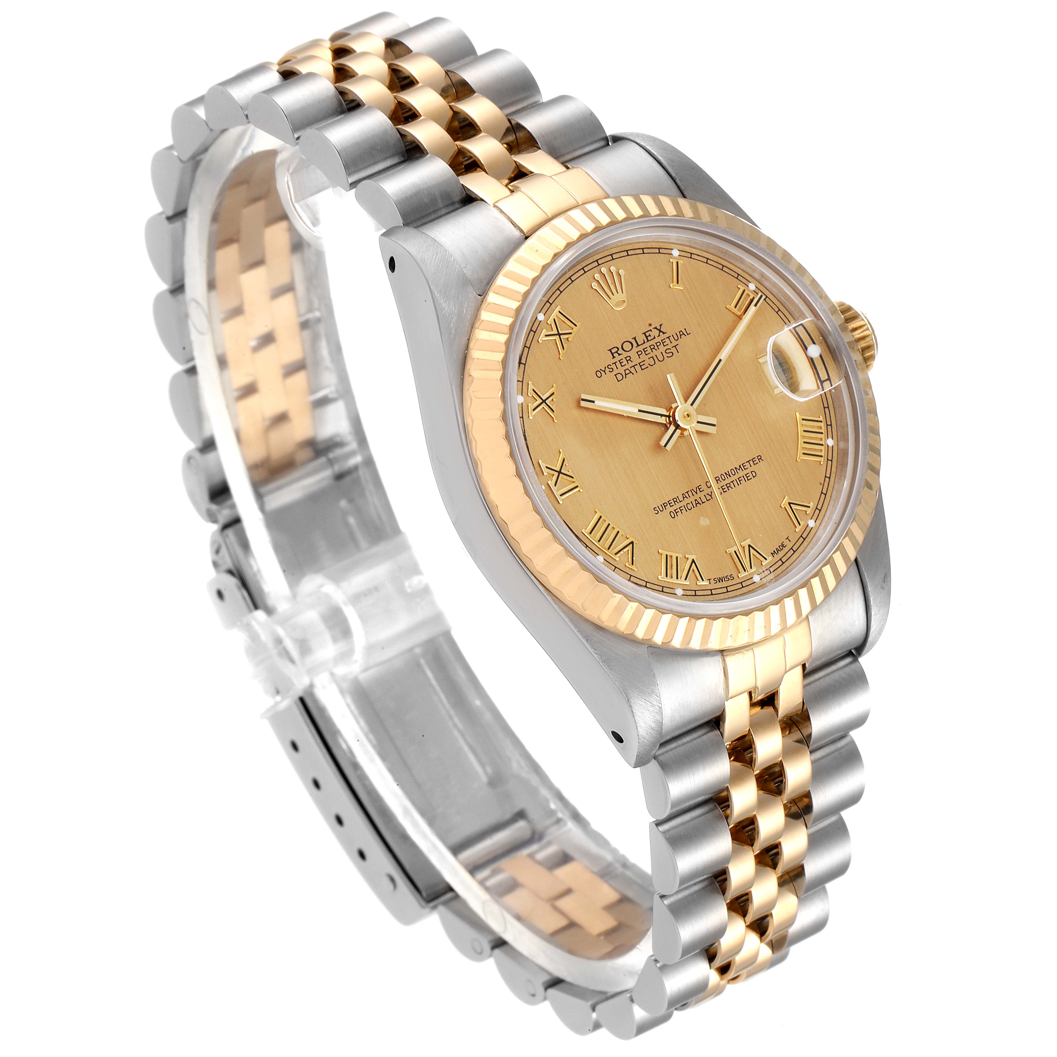 The image shows an angled view of a Rolex Mid-Size 68273 Women's Steel and Gold (two tone) Champagne Dial 68273 Women's Steel and Gold (two tone) Champagne Dial watch, highlighting its two-tone bracelet, gold fluted bezel, and champagne dial.