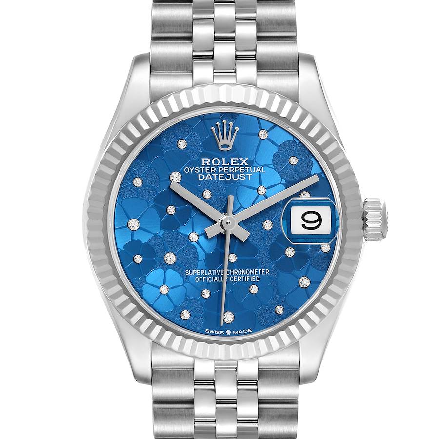 The Rolex Mid-Size Datejust is shown from the front, highlighting its blue patterned dial, silver hands, date display, and Jubilee bracelet.