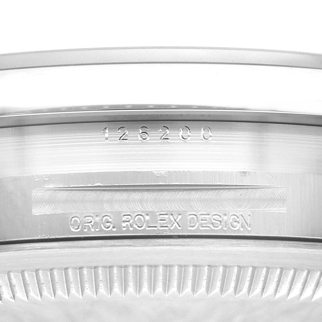 The image shows the side and serial engraving on the bezel of a Rolex Datejust 126200 Men's Stainless Steel Green Dial 126200 Men's Stainless Steel Green Dial watch.