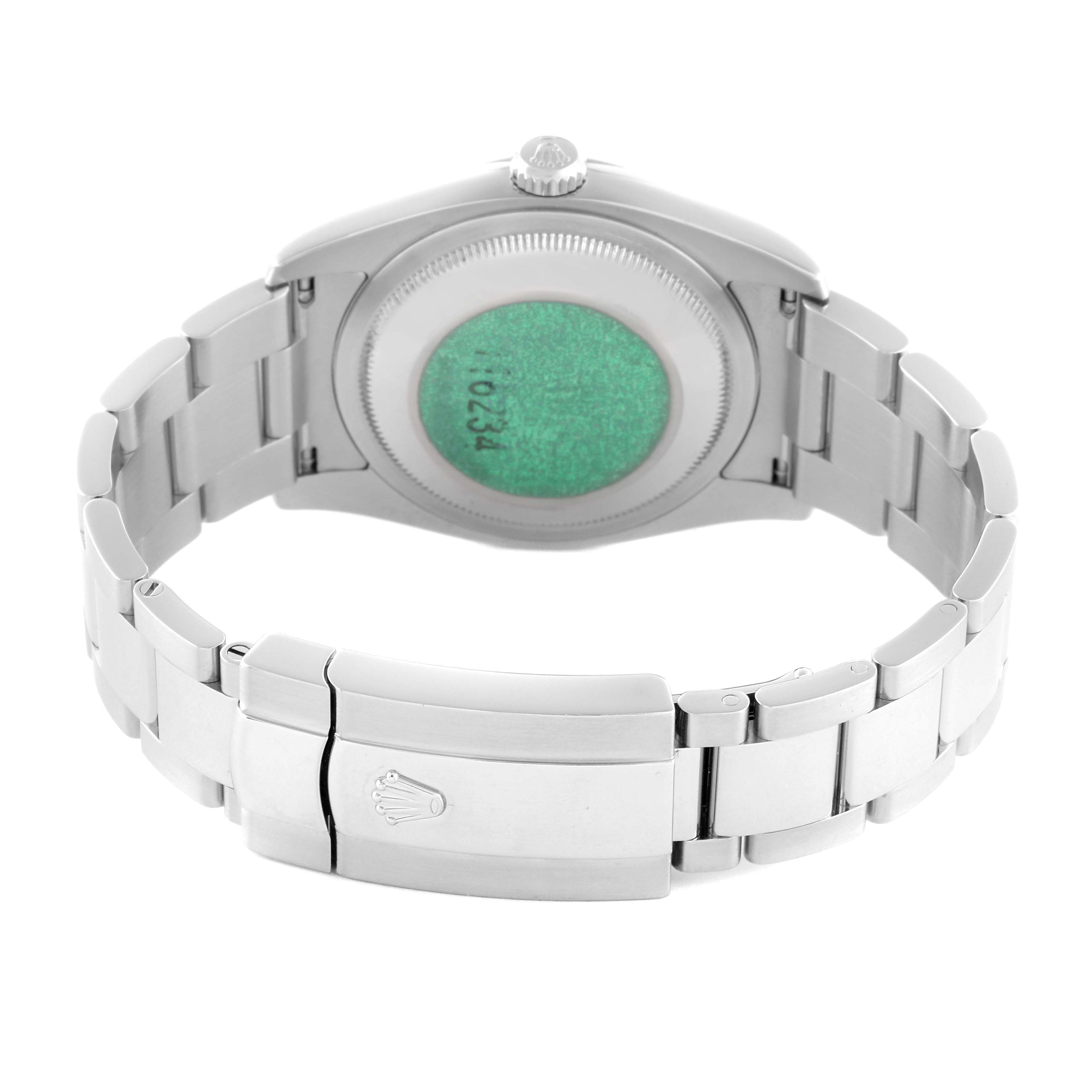 The Rolex Datejust 116234 Men
s Stainless Steel Black Dial 116234 Men
s Stainless Steel Black Dial watch is shown from the back, focusing on the case back and the metal bracelet clasp.