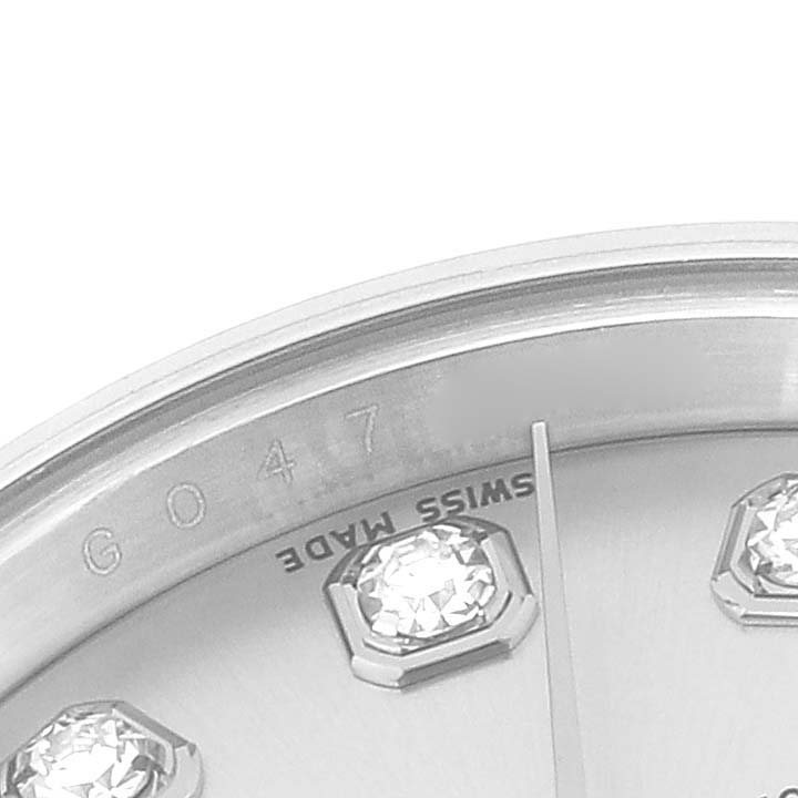 This image shows a close-up of the dial on a Rolex Datejust 179174 Women's Stainless Steel Silver Dial 179174 Women's Stainless Steel Silver Dial watch, including diamond hour markers and the "Swiss Made" text.