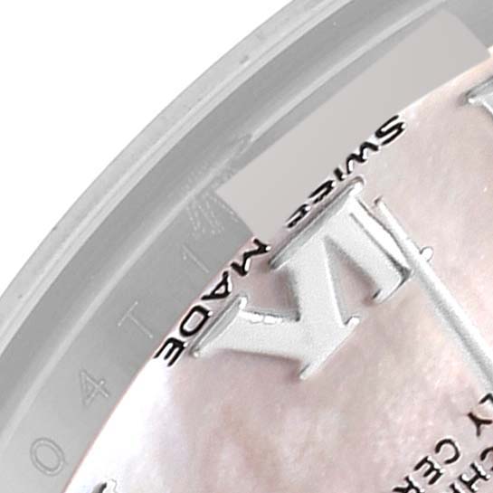 This is a close-up shot of the dial and bezel of a Rolex Datejust 179174 Women's Stainless Steel Mother of Pearl Dial 179174 Women's Stainless Steel Mother of Pearl Dial watch, showcasing the "XII" Roman numeral hour marker.