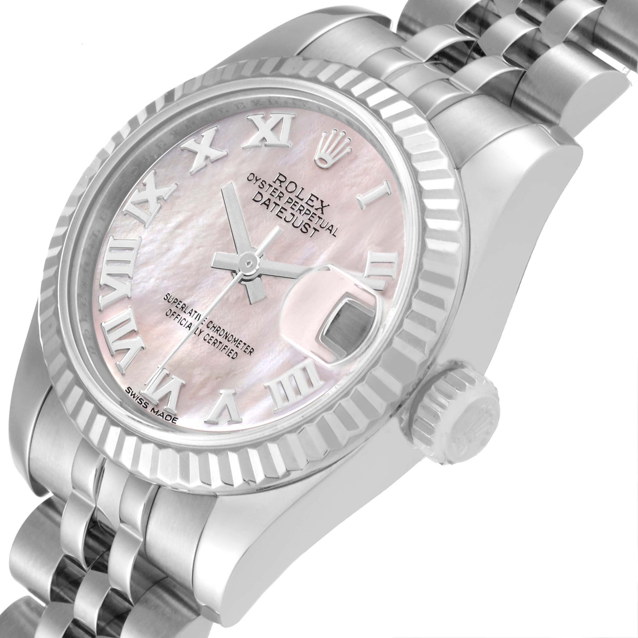 The image shows a close-up of the Rolex Datejust 179174 Women's Stainless Steel Mother of Pearl Dial 179174 Women's Stainless Steel Mother of Pearl Dial watch face and band from a slightly tilted top-down angle.