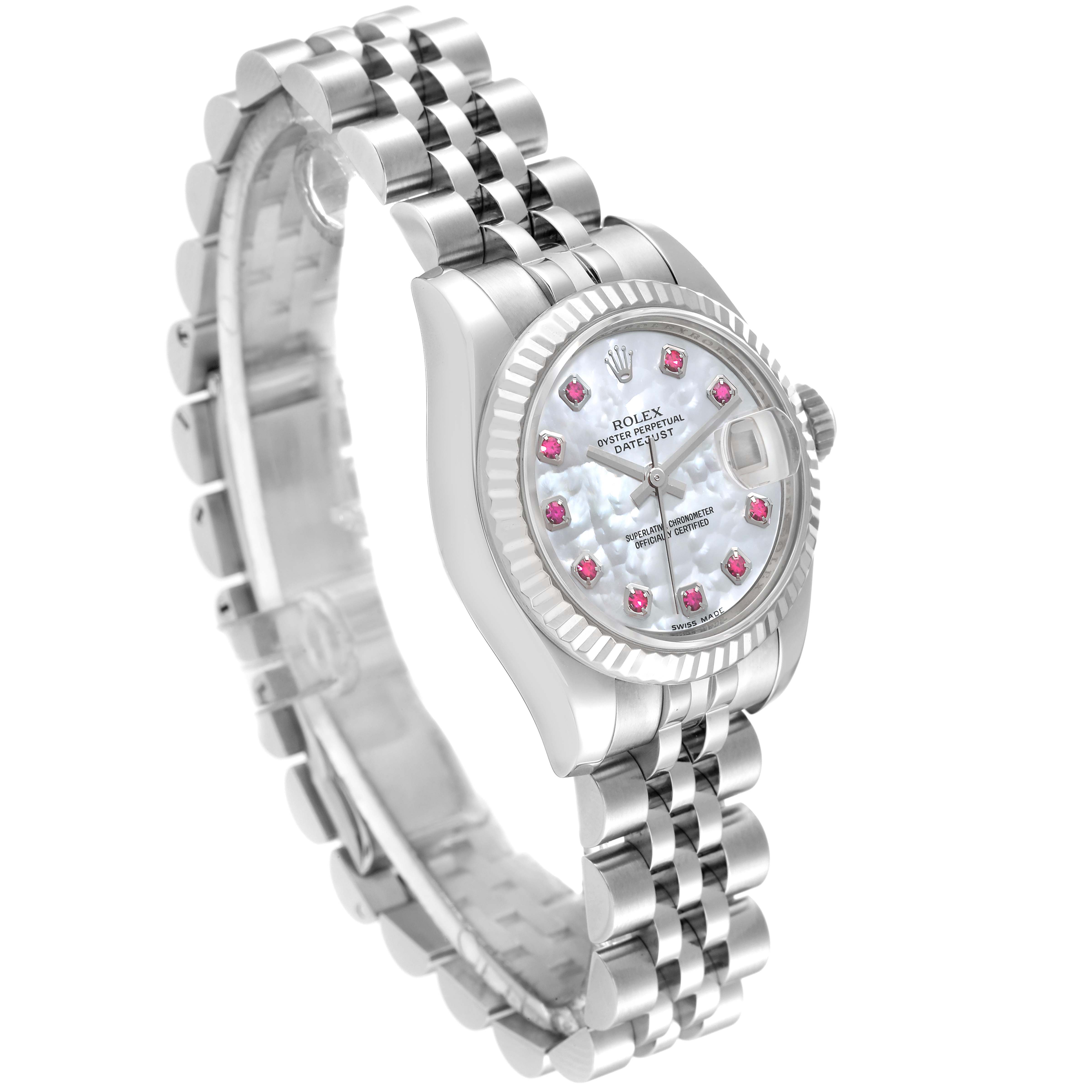 This Rolex Datejust 179174 Women's Stainless Steel Mother of Pearl Dial 179174 Women's Stainless Steel Mother of Pearl Dial watch is shown at an angled side view, displaying its bracelet, dial, bezel, and crown.