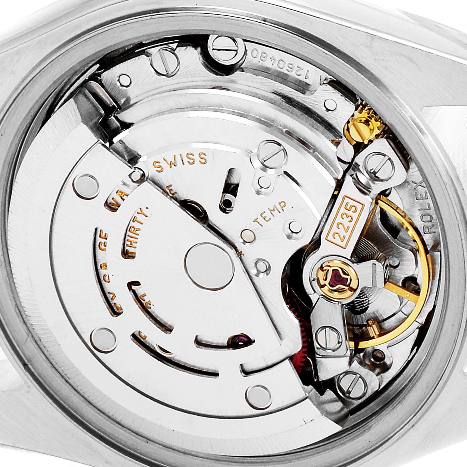 The image shows a close-up of the movement inside a Rolex Datejust 79174 Women
s Stainless Steel Silver Dial 79174 Women
s Stainless Steel Silver Dial watch.