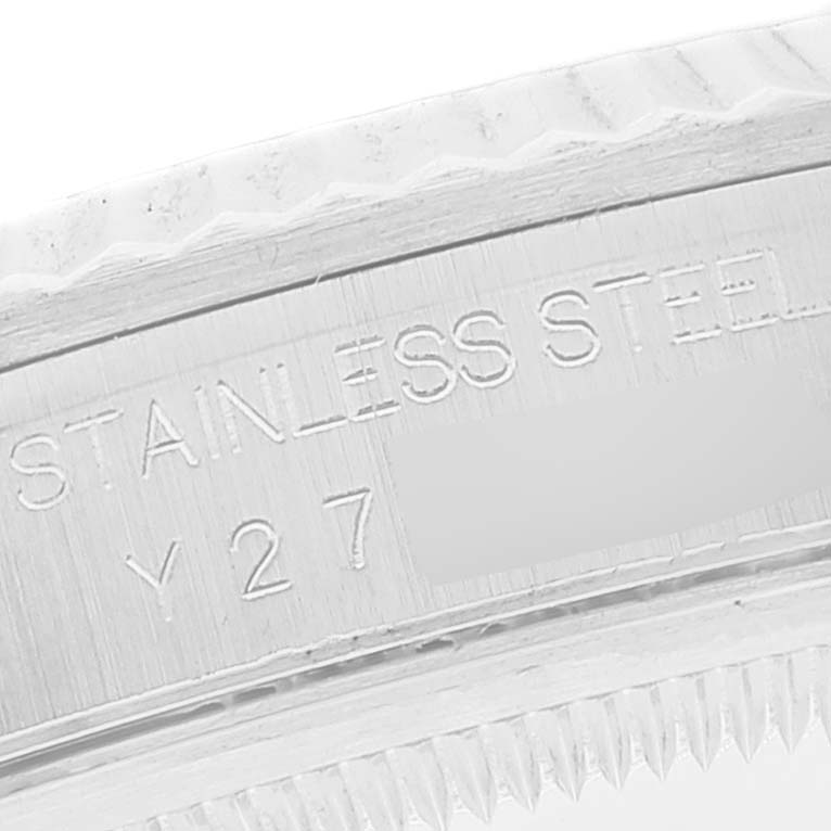 This image shows a close-up of the stainless steel engraving on the case back of a Rolex Datejust 16234 Men's Stainless Steel Silver Dial 16234 Men's Stainless Steel Silver Dial watch.