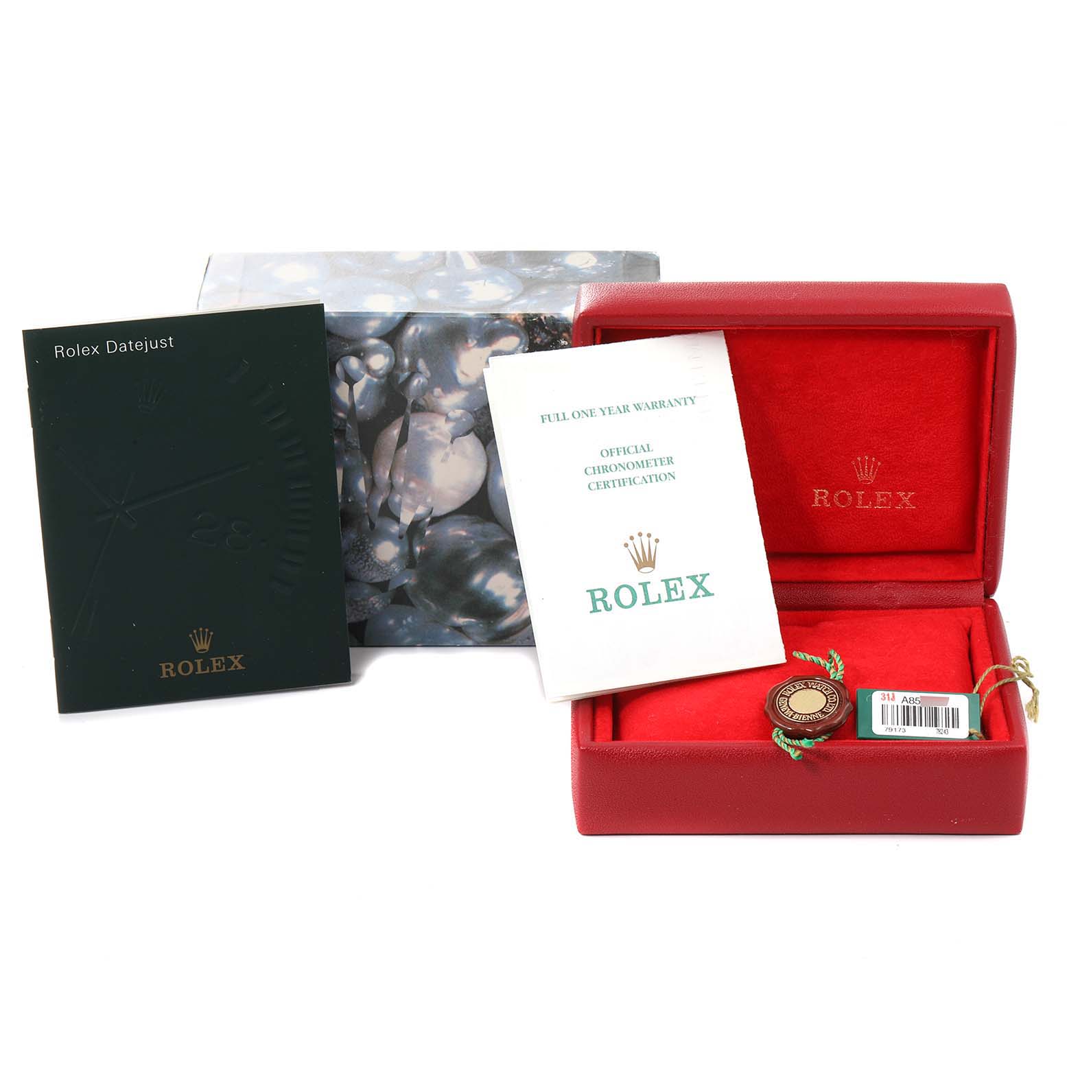 This image shows accessories for a Rolex Datejust 79173 Women's Steel and Gold (two tone) Champagne Dial 79173 Women's Steel and Gold (two tone) Champagne Dial model, including a box, warranty card, booklet, and certification.