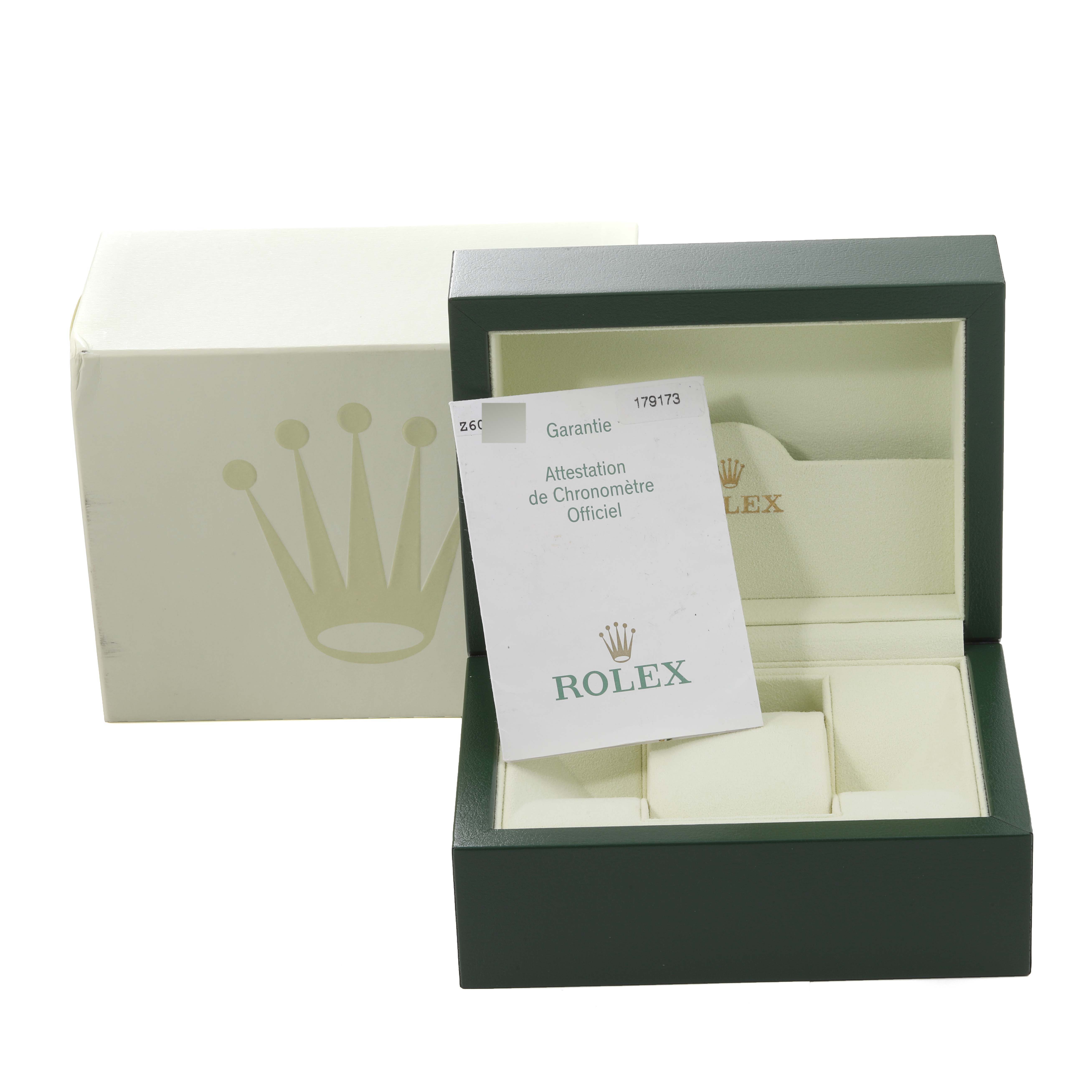 The image shows a Rolex Datejust 179173 Women's Steel and Gold (two tone) Champagne Dial 179173 Women's Steel and Gold (two tone) Champagne Dial watch box open, revealing the interior and warranty card.