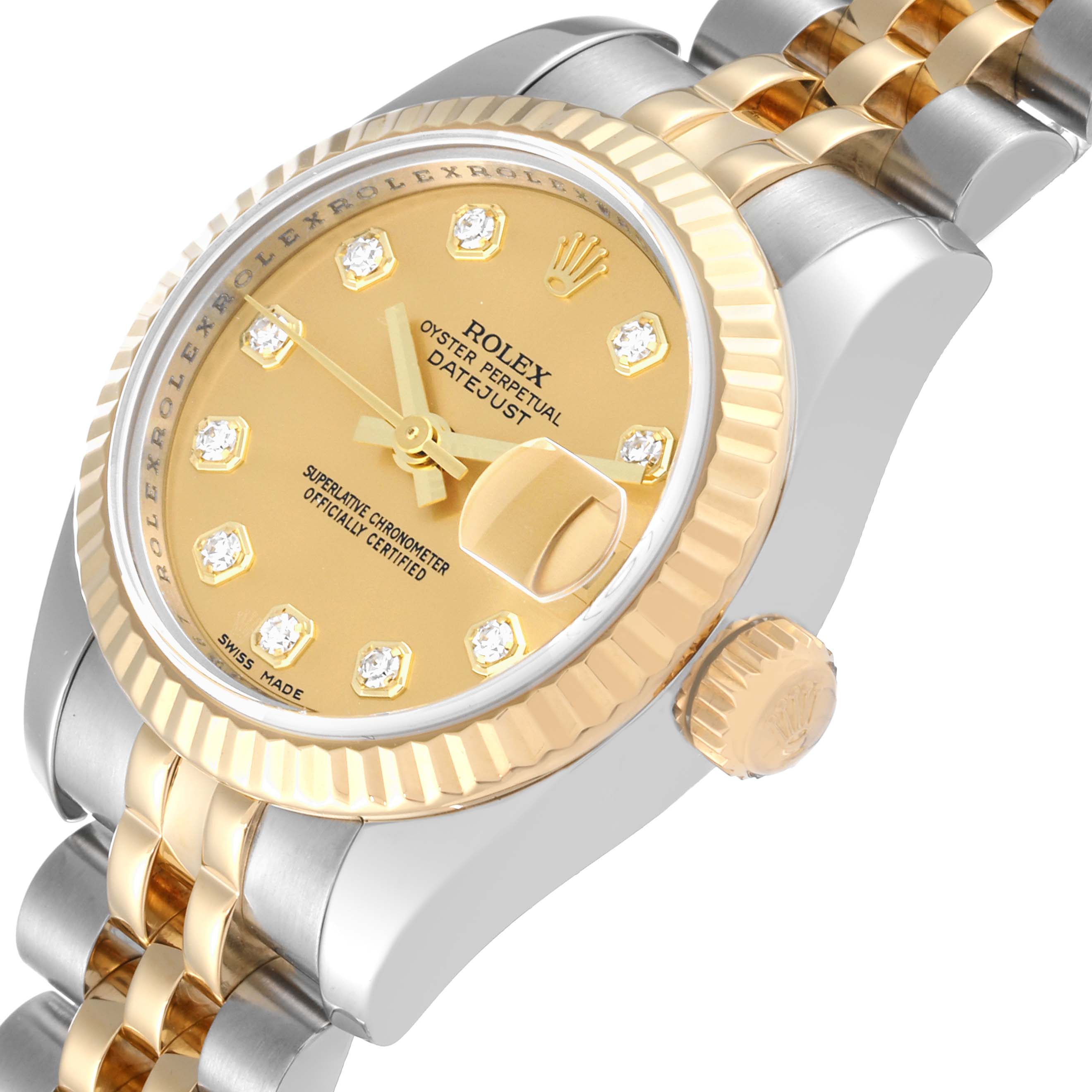 The image shows a close-up of the Rolex Datejust 179173 Women's Steel and Gold (two tone) Champagne Dial 179173 Women's Steel and Gold (two tone) Champagne Dial watch's face, bezel, crown, and part of the Jubilee bracelet at an angle.