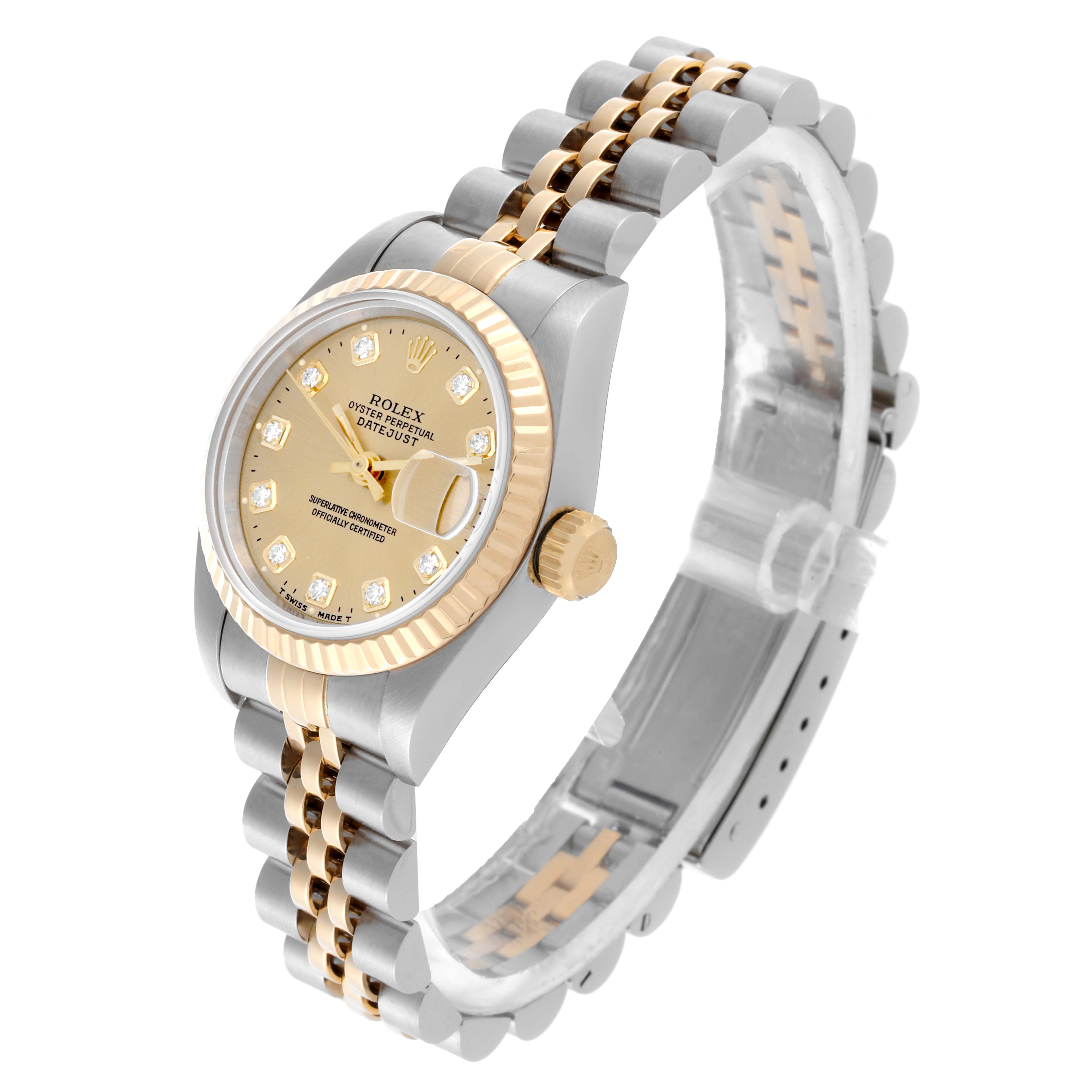 The Rolex Datejust 69173 Women's Steel and Gold (two tone) Champagne Dial 69173 Women's Steel and Gold (two tone) Champagne Dial watch is shown at an angled view, highlighting the dial, bezel, crown, and Jubilee bracelet.
