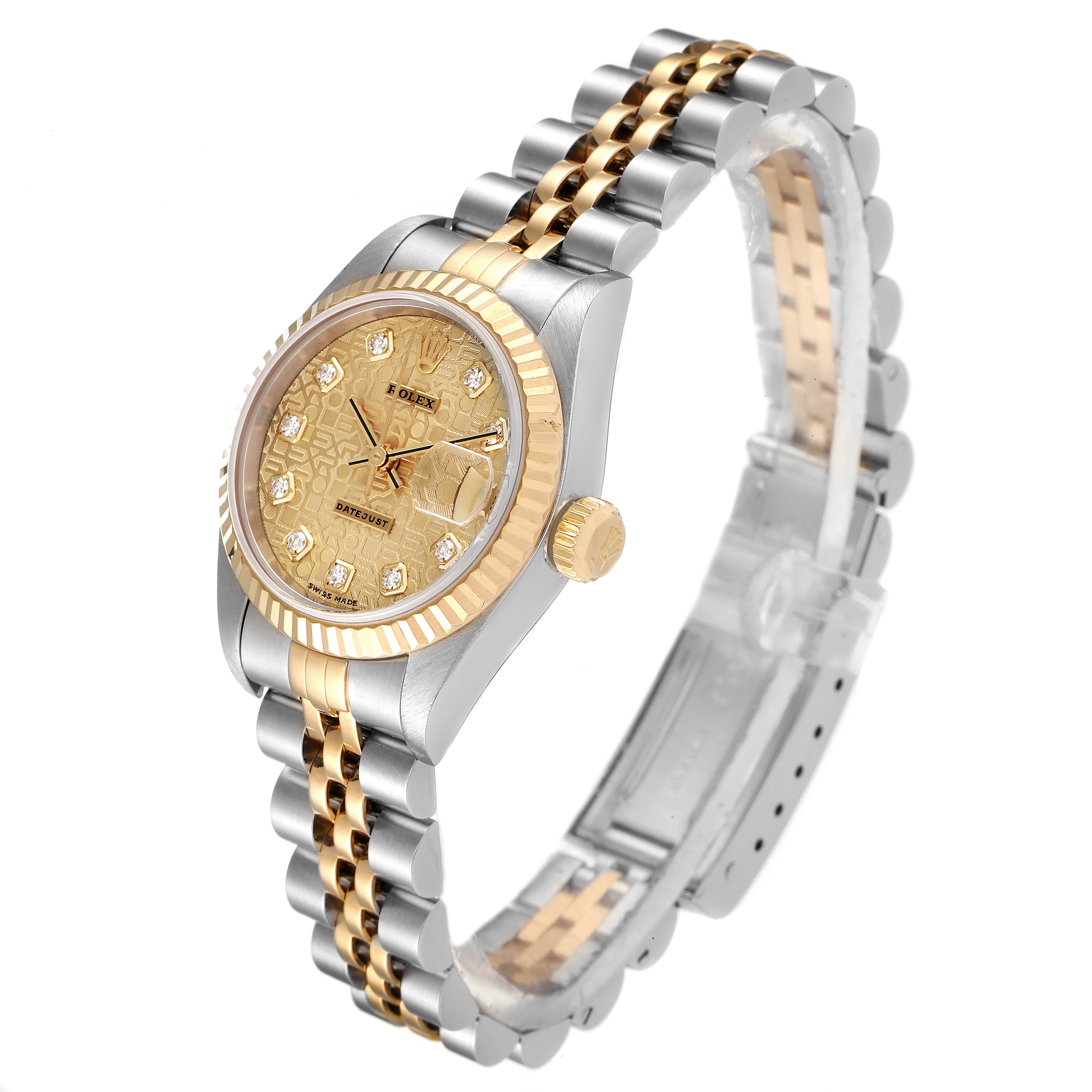 The Rolex Datejust 79173 Women's Steel and Gold (two tone) Champagne Dial 79173 Women's Steel and Gold (two tone) Champagne Dial watch is shown at a three-quarter angle, highlighting its gold bezel, crown, dial, and two-tone bracelet.