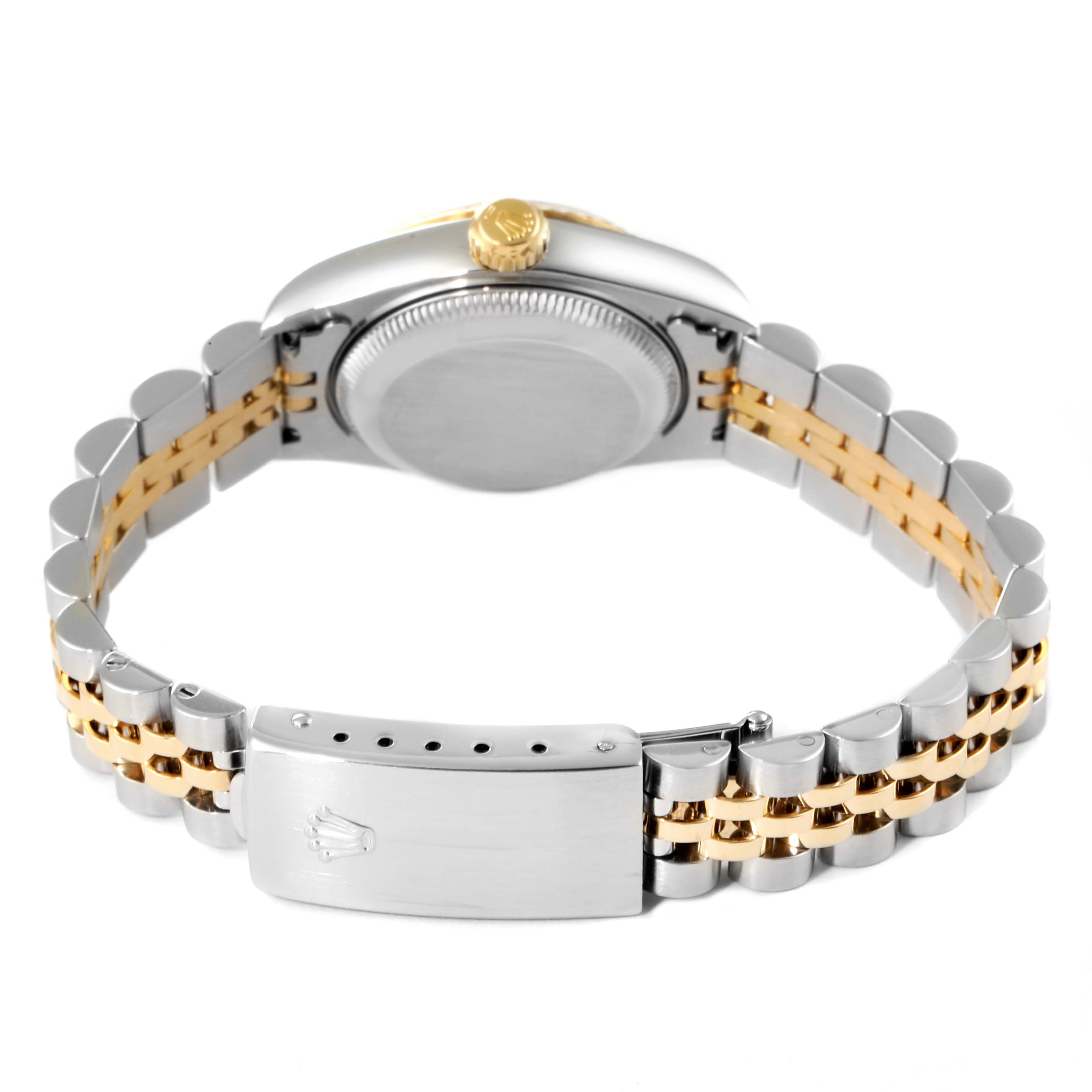 The image shows the back, crown, and bracelet clasp of a Rolex Datejust 79173 Women's Steel and Gold (two tone) Champagne Dial 79173 Women's Steel and Gold (two tone) Champagne Dial watch.