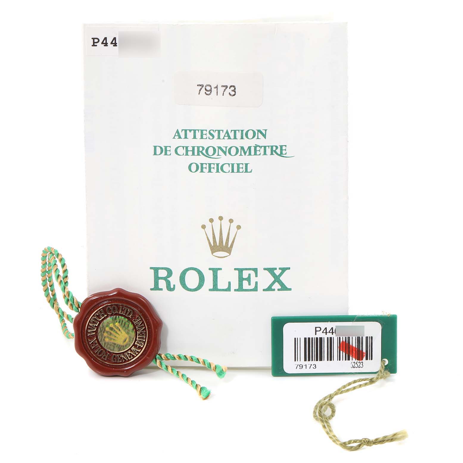 This image shows the certificate, tags, and accessories for a Rolex Datejust 79173 Women's Steel and Gold (two tone) Champagne Dial 79173 Women's Steel and Gold (two tone) Champagne Dial model.