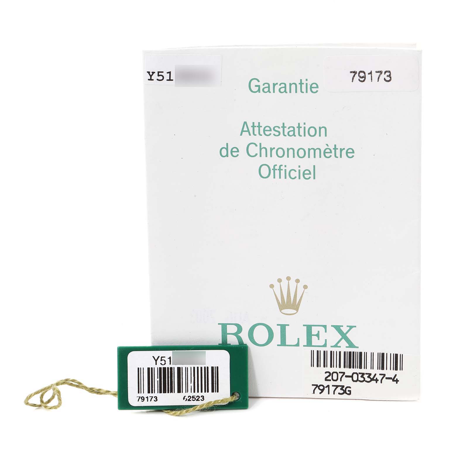 The image shows the warranty card and tag for a Rolex Datejust 79173 Women's Steel and Gold (two tone) Champagne Dial 79173 Women's Steel and Gold (two tone) Champagne Dial watch.