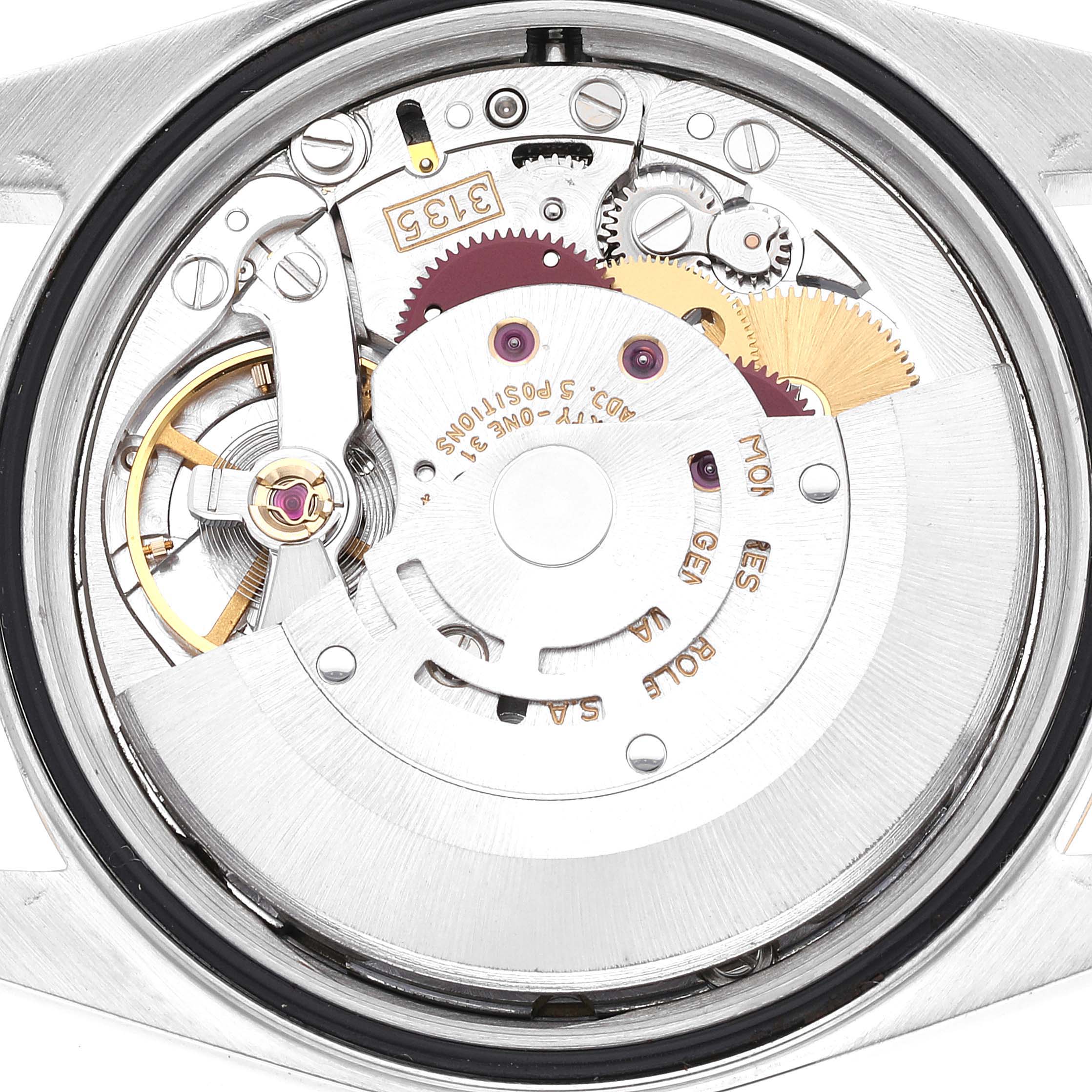 This image shows the movement mechanism of a Rolex Datejust 16233 Men's Steel and Gold (two tone) Champagne Dial 16233 Men's Steel and Gold (two tone) Champagne Dial watch viewed from the back case.