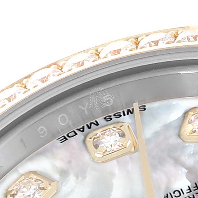 The image shows a close-up of the dial and diamond-studded bezel of a Rolex Datejust 179383 Women's Steel and Gold (two tone) Mother of Pearl Dial 179383 Women's Steel and Gold (two tone) Mother of Pearl Dial watch, highlighting the "SWISS MADE" marking.