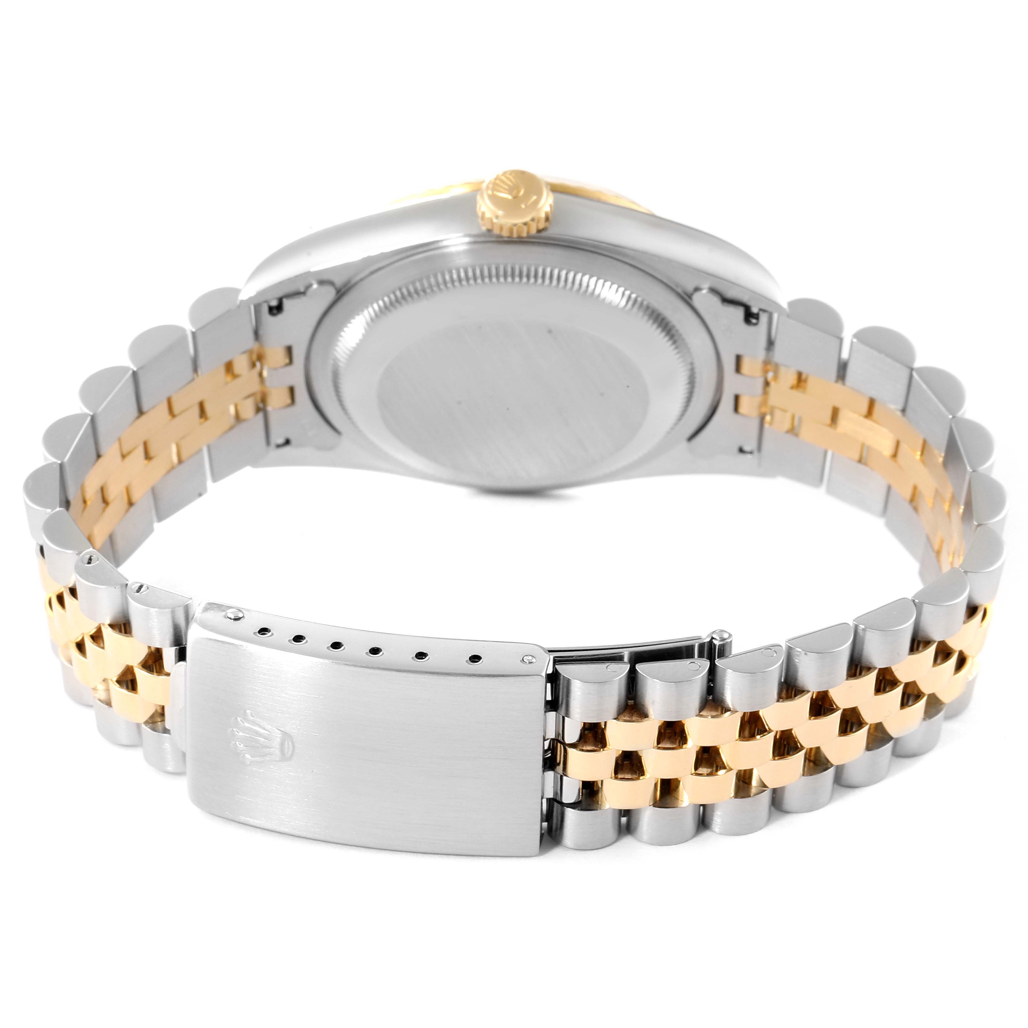 This image shows the back view of a Rolex Datejust 16233 Men's Steel and Gold (two tone) Beige Dial 16233 Men's Steel and Gold (two tone) Beige Dial watch, highlighting its two-tone band and clasp.