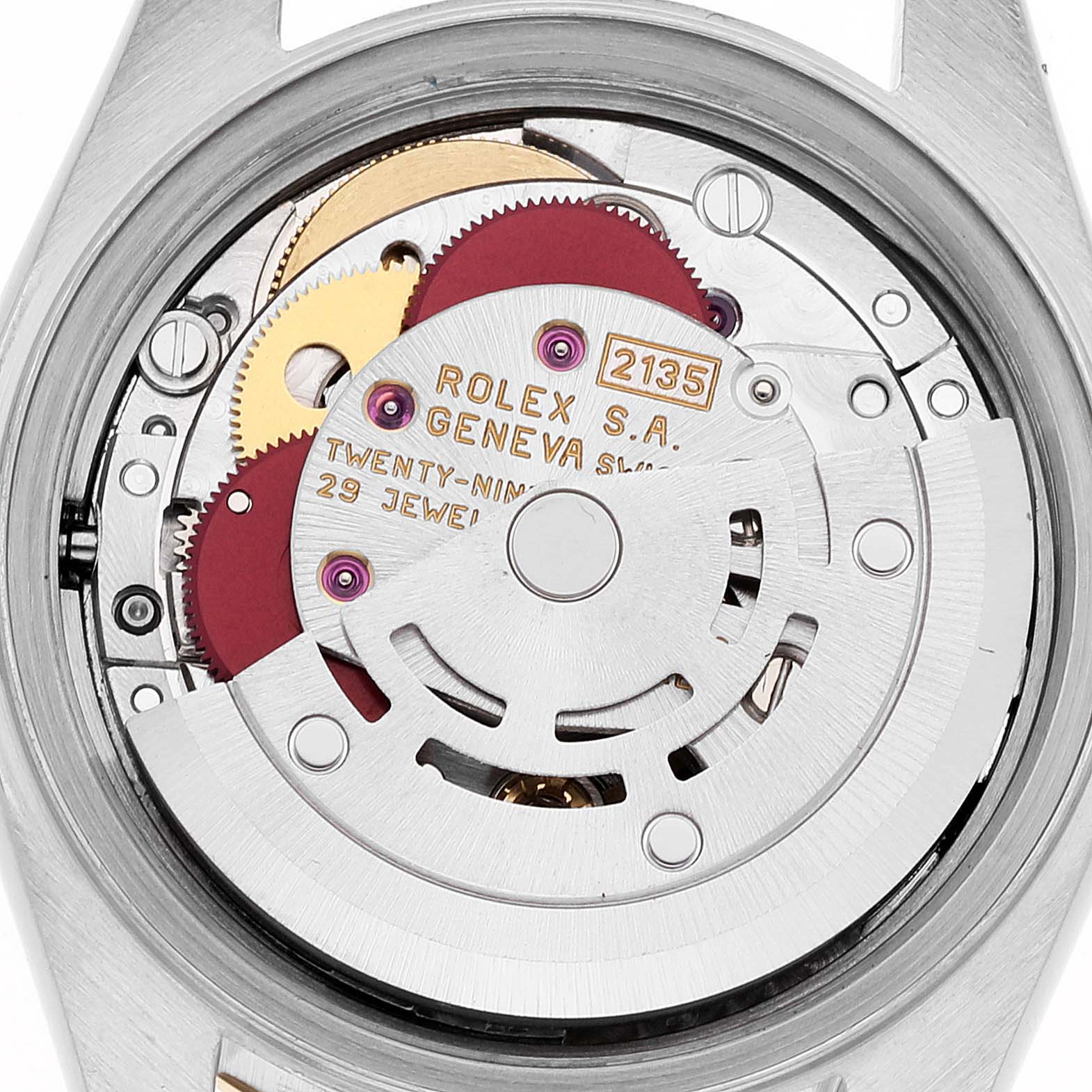 The image shows the internal mechanical movement of a Rolex Datejust 69163 Women's Steel and Gold (two tone) Grey Dial 69163 Women's Steel and Gold (two tone) Grey Dial watch, highlighting its intricate gears and components.