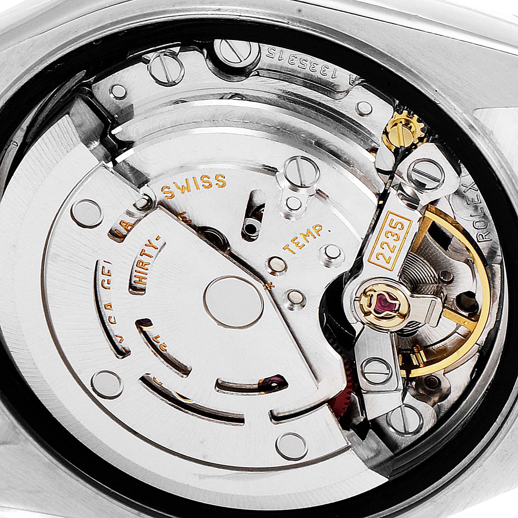 The image shows a close-up of the Rolex Datejust 79173 Women's Steel and Gold (two tone) White Dial 79173 Women's Steel and Gold (two tone) White Dial movement, specifically the caliber 2235, from the rear angle.