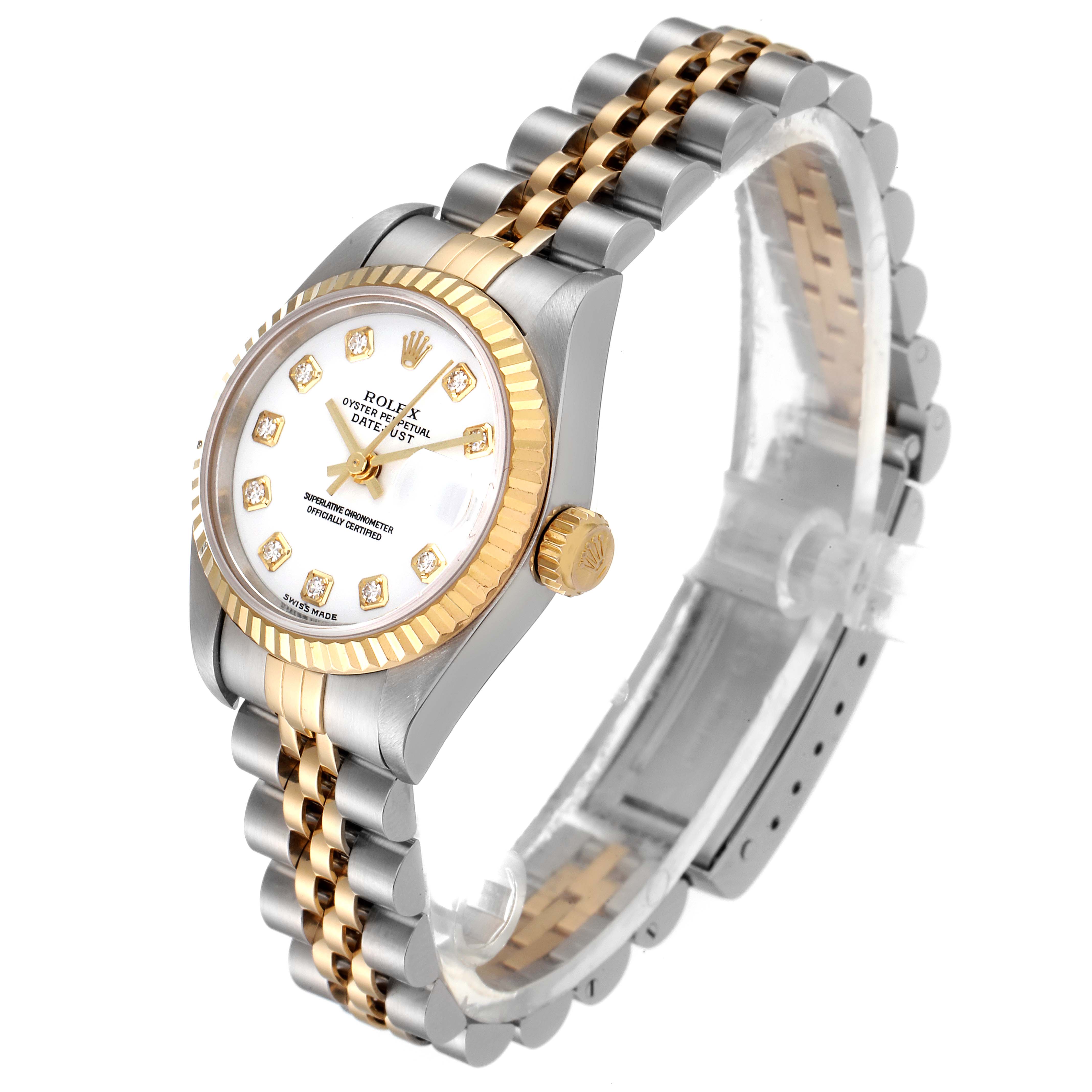 The image shows a Rolex Datejust 79173 Women's Steel and Gold (two tone) White Dial 79173 Women's Steel and Gold (two tone) White Dial watch focused on the dial, bezel, and two-tone bracelet at a slight angle.