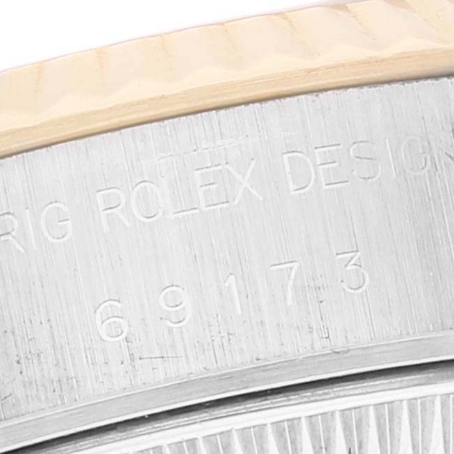 The image shows a close-up of the engraved case side of the Rolex Datejust 69173 Women's Steel and Gold (two tone) White Dial 69173 Women's Steel and Gold (two tone) White Dial watch, highlighting its model number.