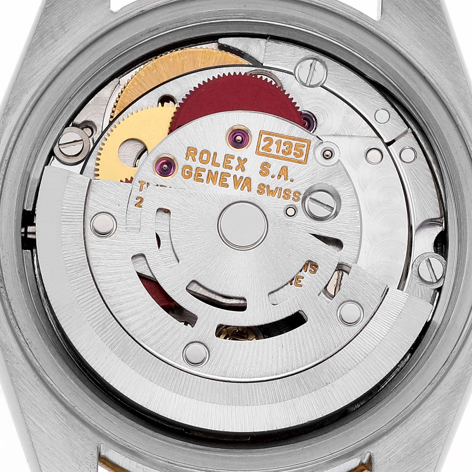 This is the inner movement of a Rolex Datejust 69173 Women's Steel and Gold (two tone) White Dial 69173 Women's Steel and Gold (two tone) White Dial watch, showing its mechanical components and inscriptions.