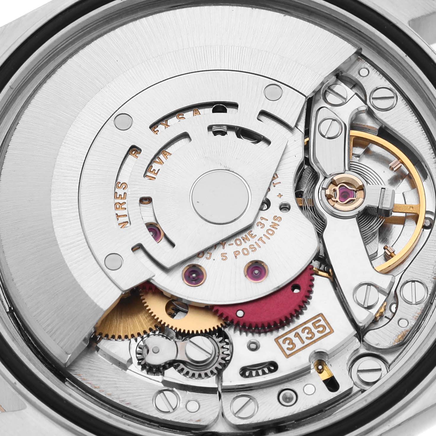 The image shows the movement and internal mechanics of the Rolex Datejust 16233 Men's Steel and Gold (two tone) Blue Dial 16233 Men's Steel and Gold (two tone) Blue Dial watch from a close-up angle.