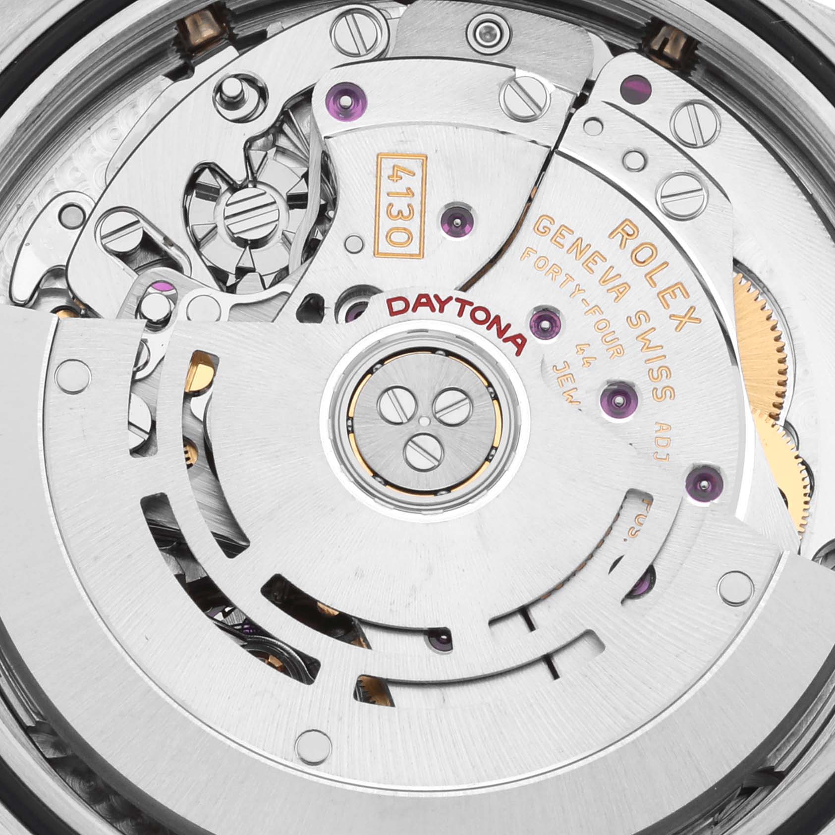 The image shows the movement mechanism of a Rolex Daytona 116523 Men's Steel and Gold (two tone) Black Dial 116523 Men's Steel and Gold (two tone) Black Dial watch, highlighting gears and components from the back angle.