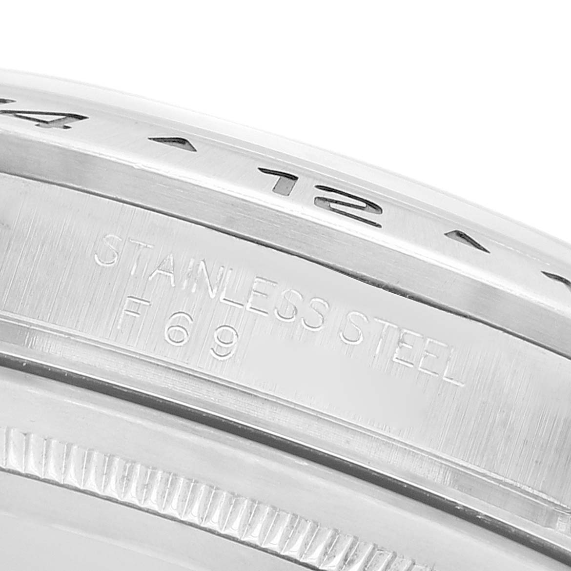 This image shows a close-up of the stainless steel casing and bezel of a Rolex Explorer 16570 Men
s Stainless Steel White Dial 16570 Men
s Stainless Steel White Dial watch.