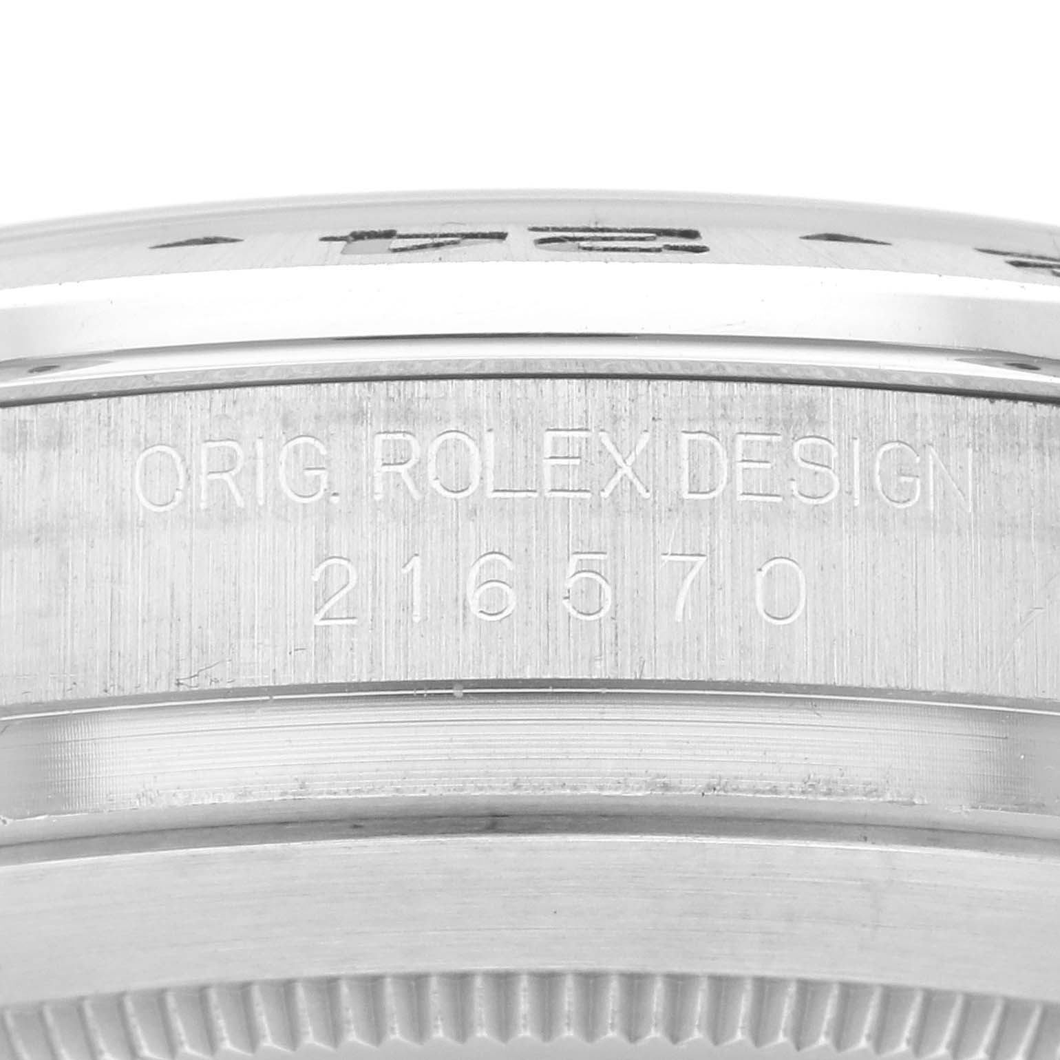 The image shows the engraving on the side of the Rolex Explorer 216570 Men's Stainless Steel White Dial 216570 Men's Stainless Steel White Dial's watch case, featuring the design number.