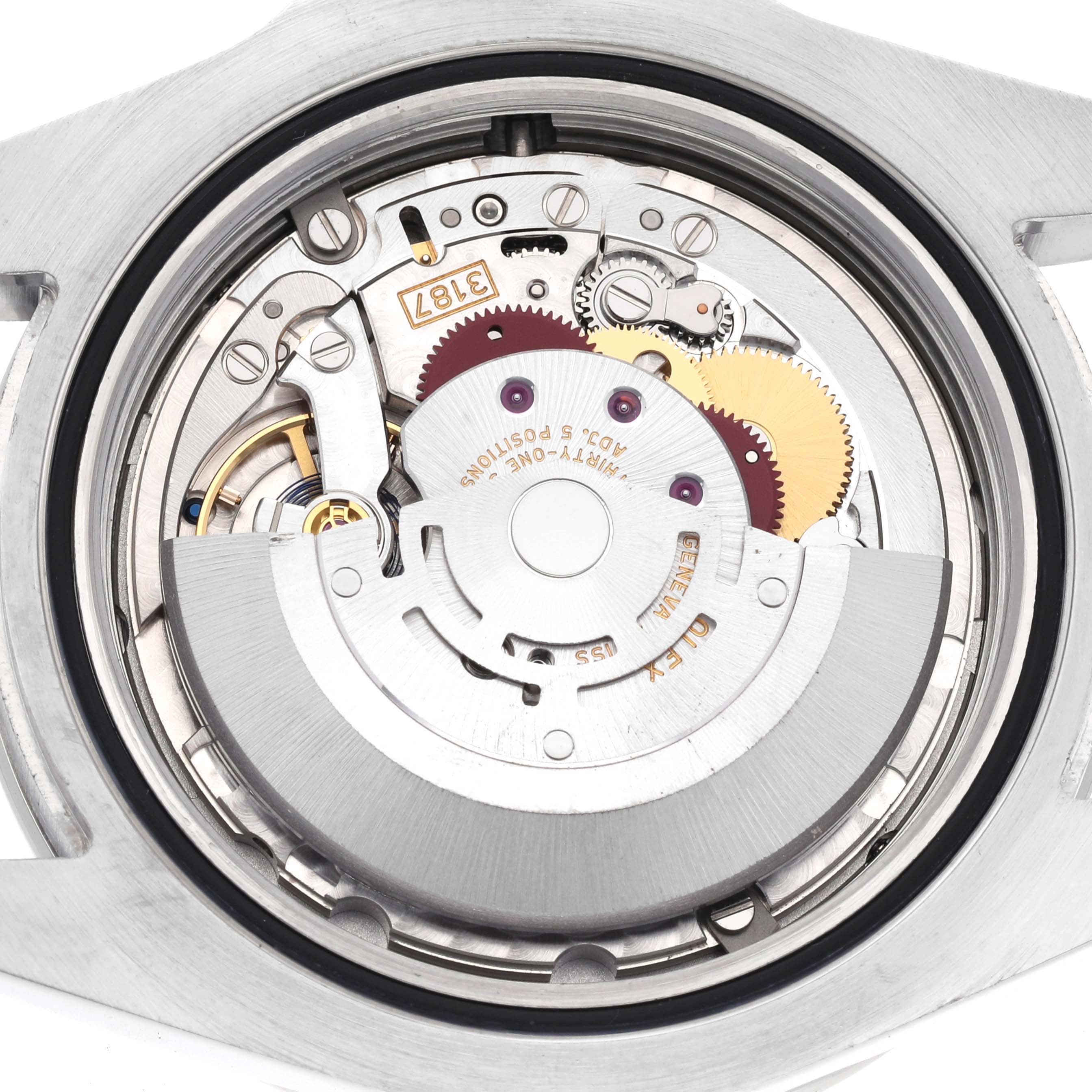 The image shows the Rolex Explorer 216570 Men's Stainless Steel White Dial 216570 Men's Stainless Steel White Dial's movement from the back, highlighting gears and the rotor.