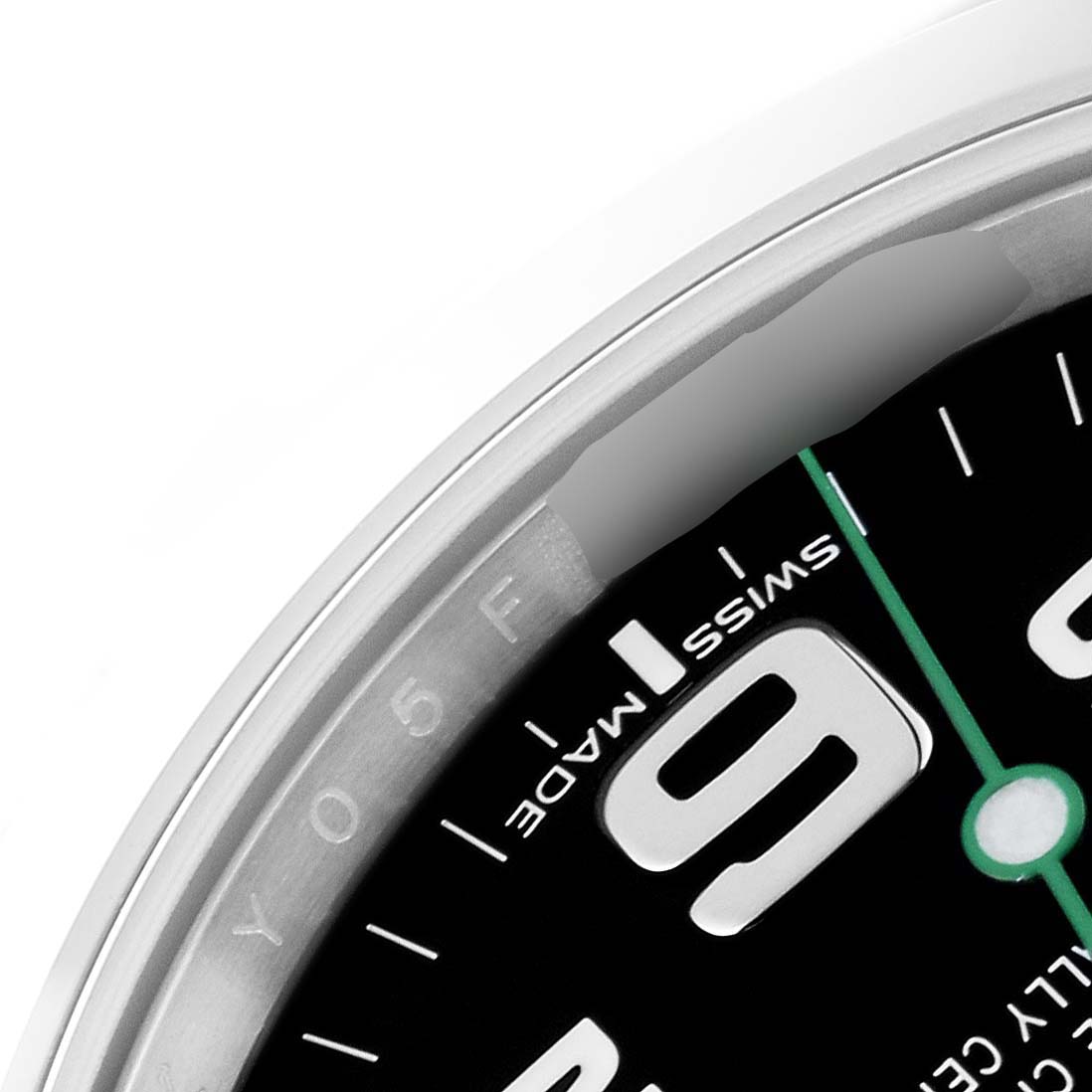 This is a close-up of the Rolex Air-King 116900 Men's Stainless Steel Black Dial 116900 Men's Stainless Steel Black Dial watch, showing part of the dial with the "9" numeral and "SWISS MADE" text.