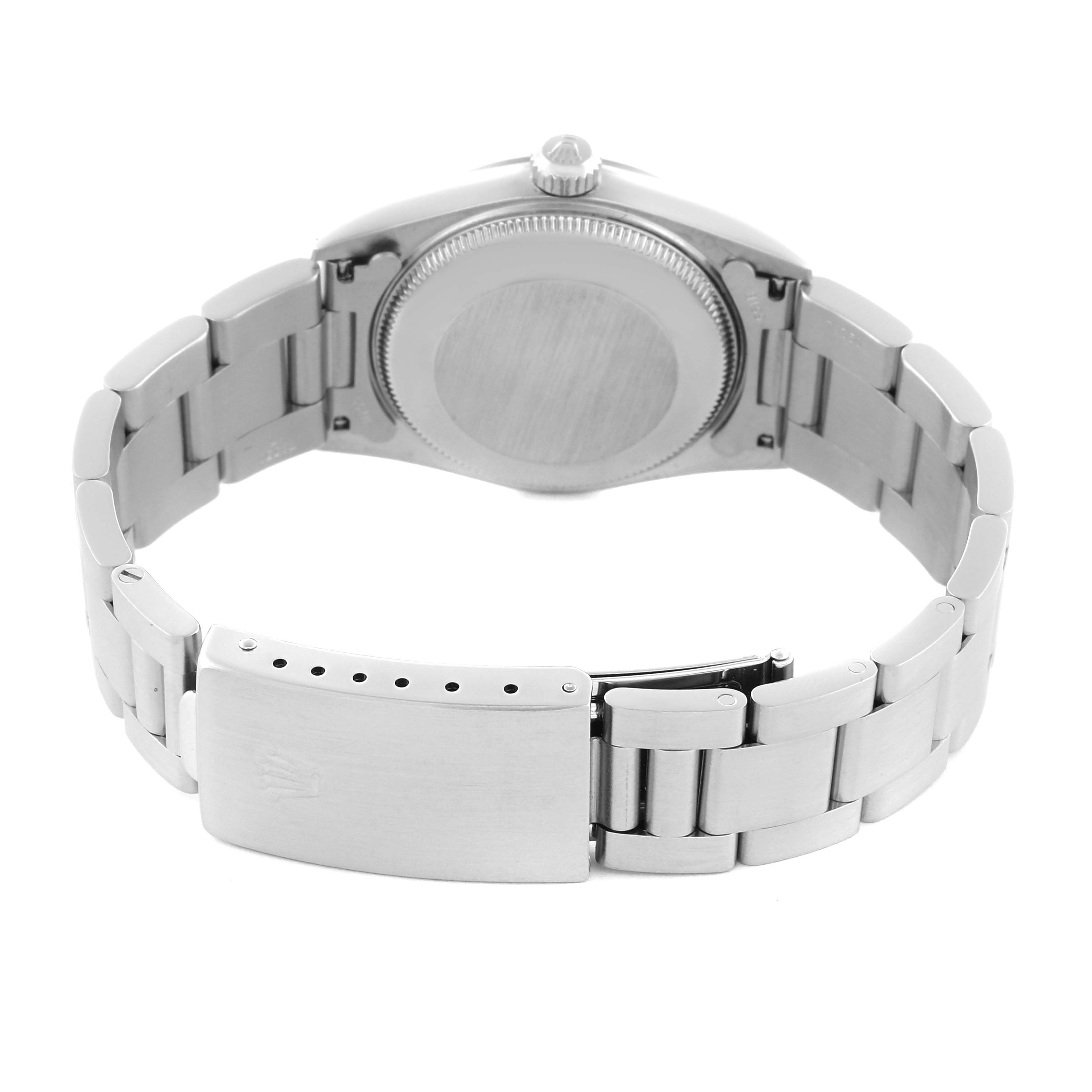 The back view of the Rolex Mid-Size 77080 Women's Stainless Steel Silver Dial 77080 Women's Stainless Steel Silver Dial watch shows the case and the bracelet clasp.